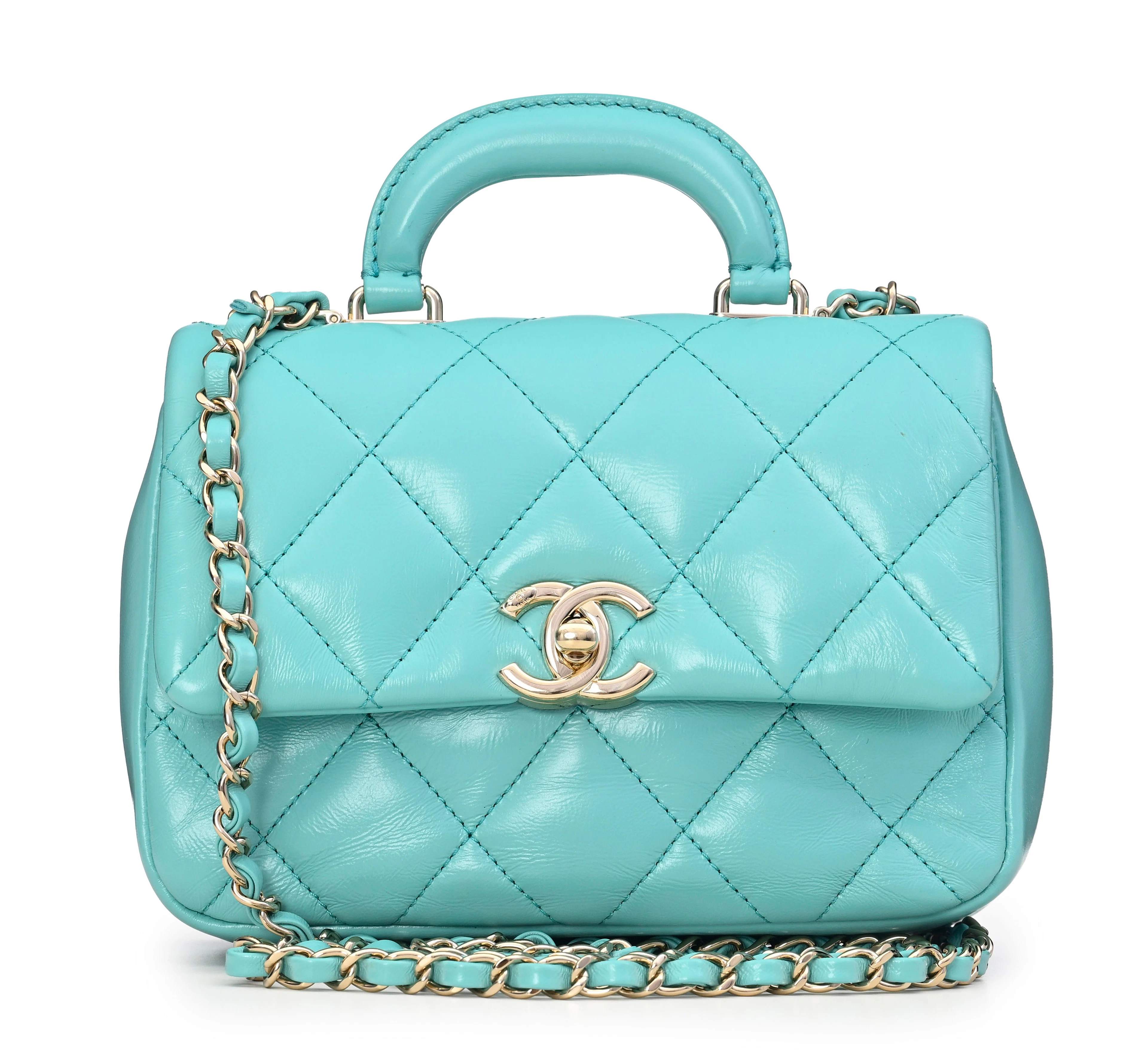 Chanel, sac à rabat Mini Coco Trip en cuir d'agneau turquoise brillant