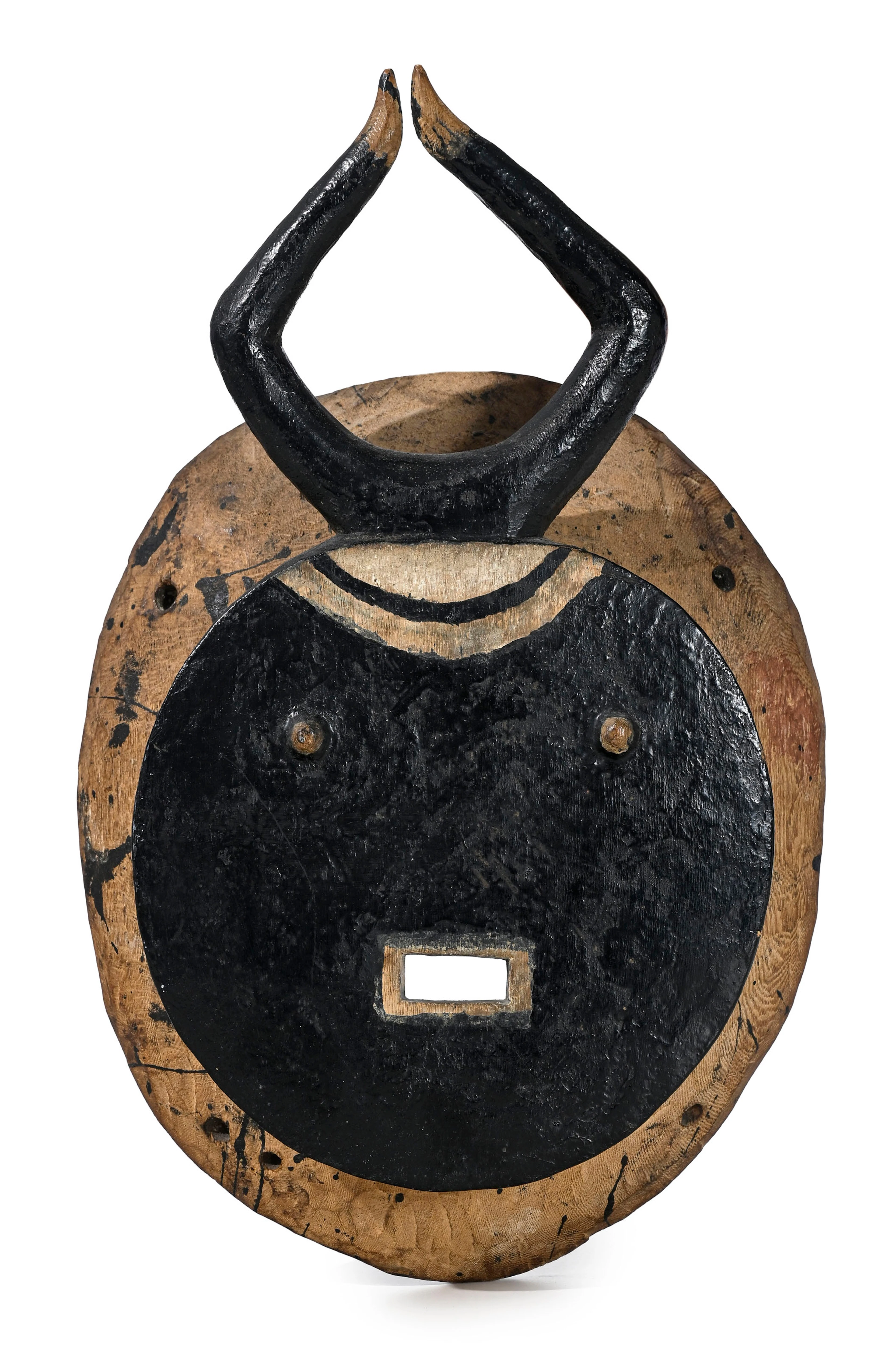 Masque circulaire kpleple (Goli) Baoulé, bois peint en noir, visage