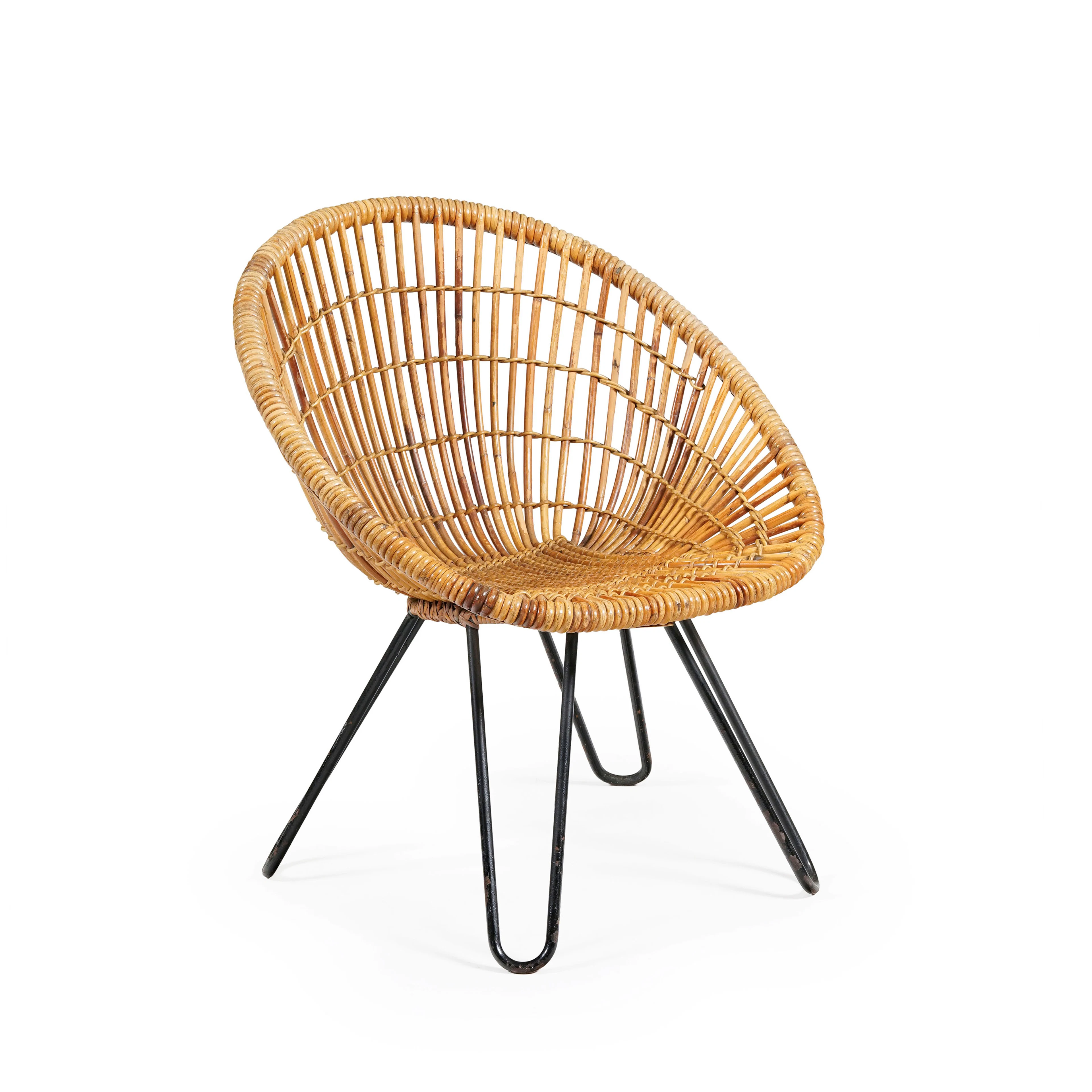Fauteuil, XXe s., structure en rotin reposant sur quatre pieds en