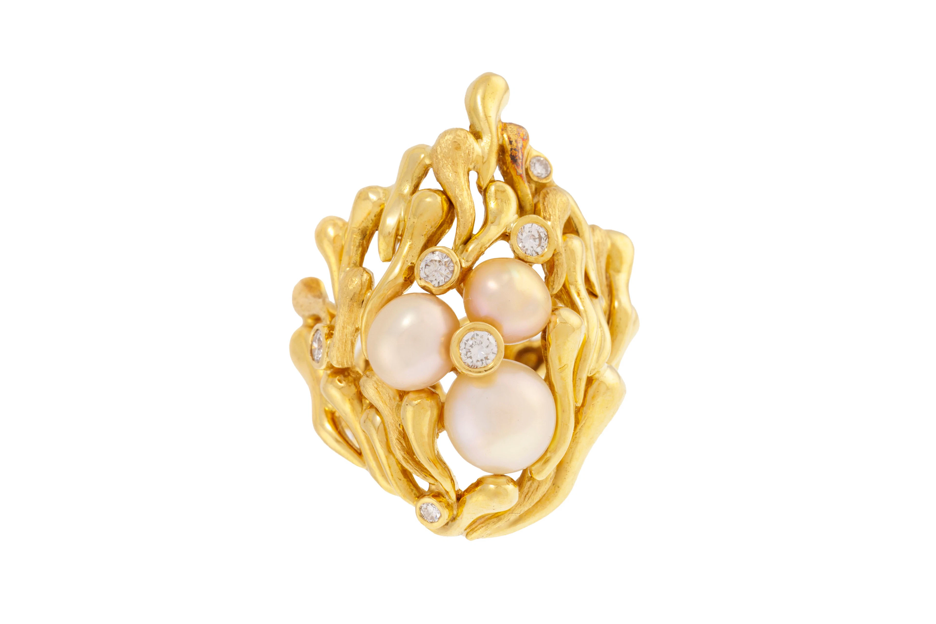 Gilbert Albert, bague or 750 à décor végétal stylisé enserrant des