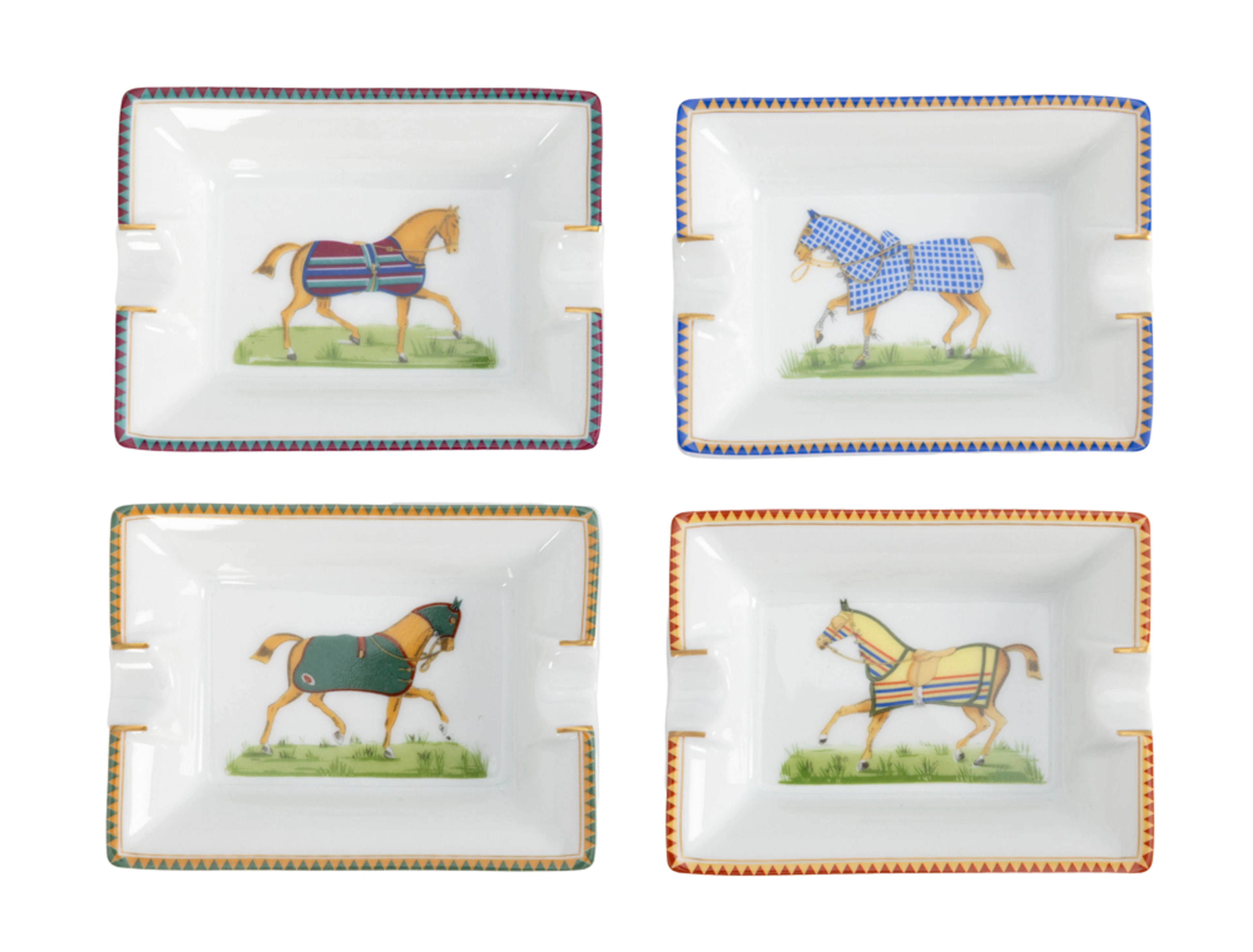 Hermès. Suite de 4 petits vide-poches cendriers en porcelaine, Paris