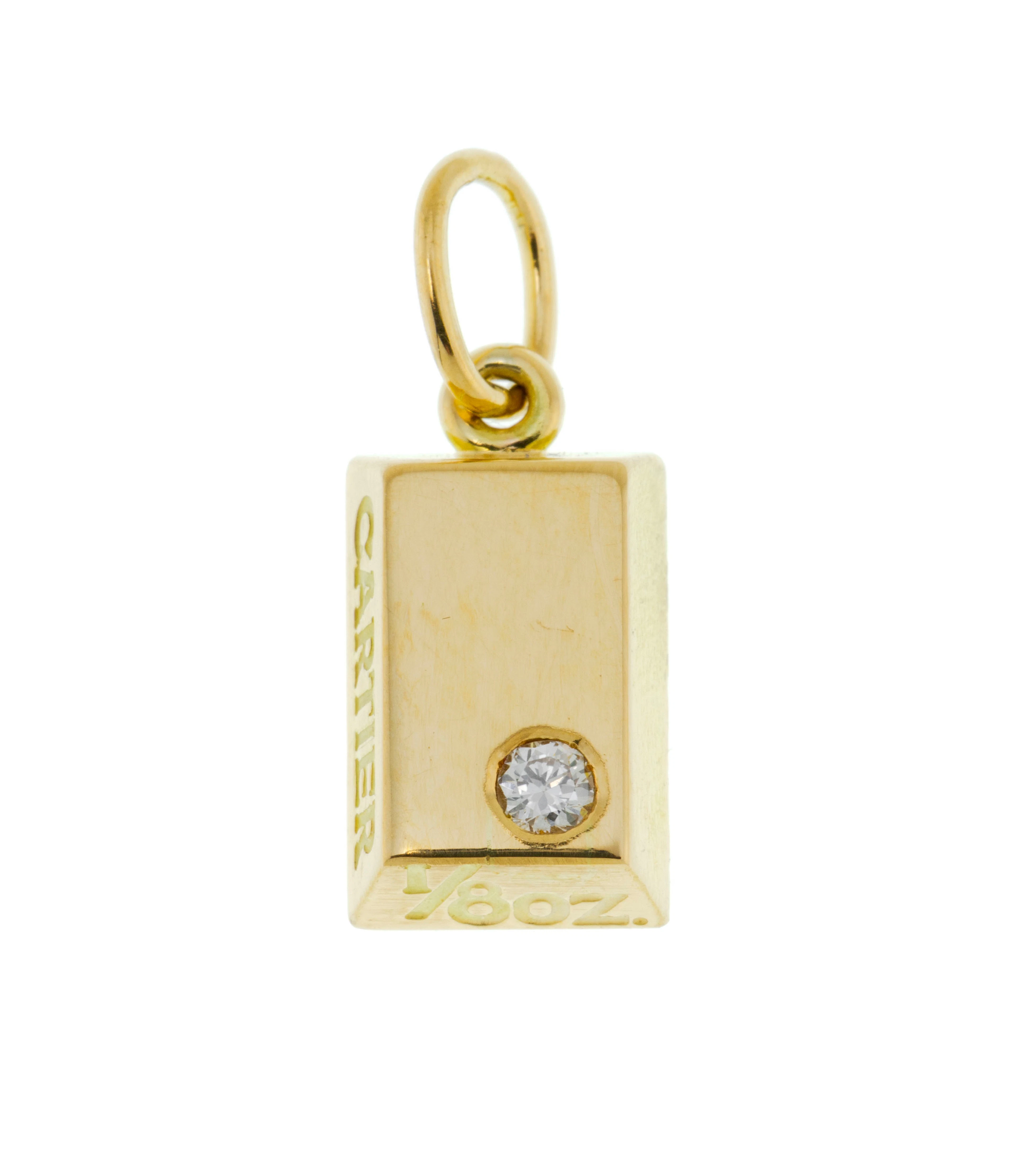 Cartier, pendentif lingot or 750 serti d'un diamant taille brillant