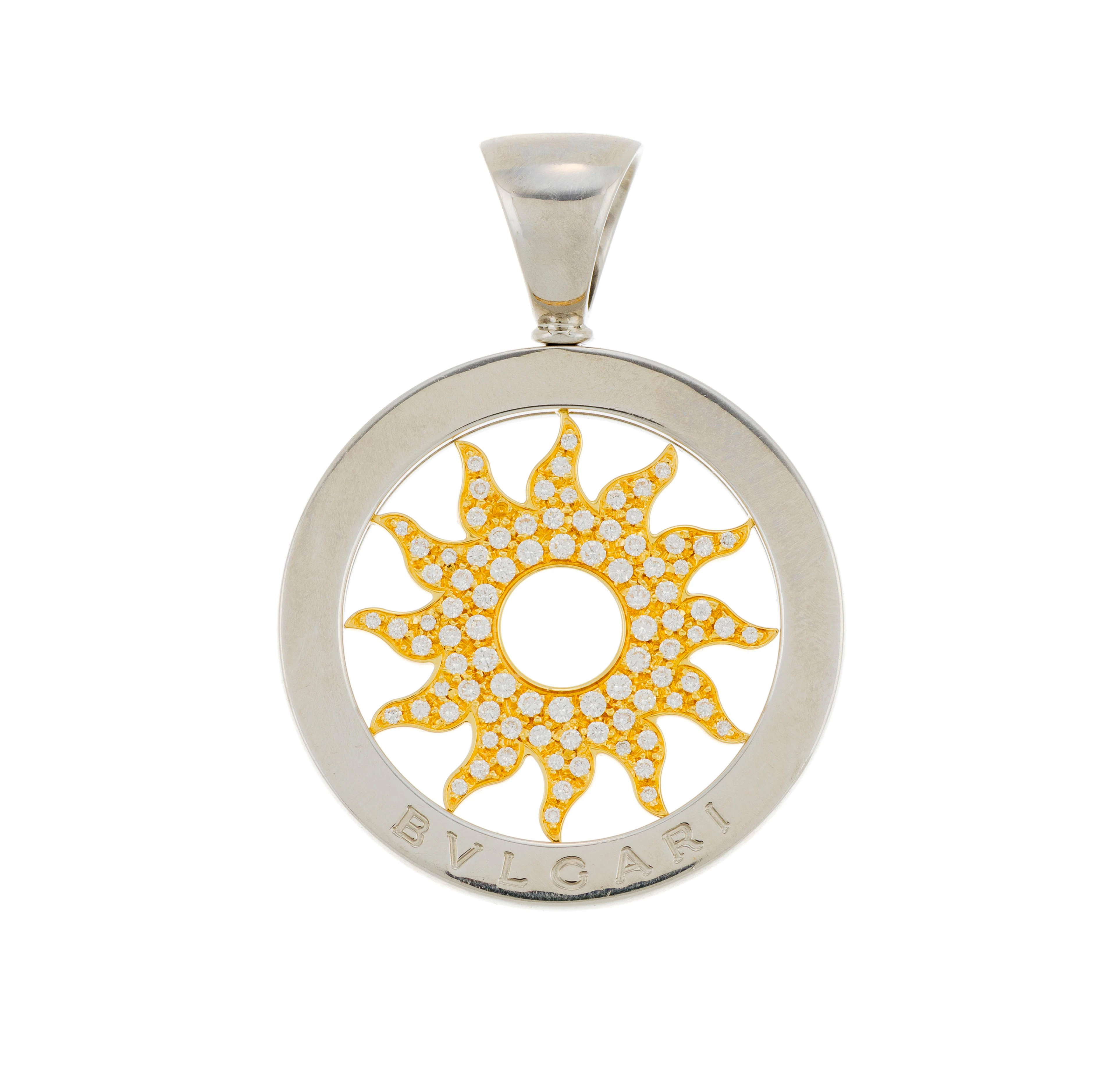 Bulgari, Tondo, pendentif or 750 et acier à motif soleil ajouré serti