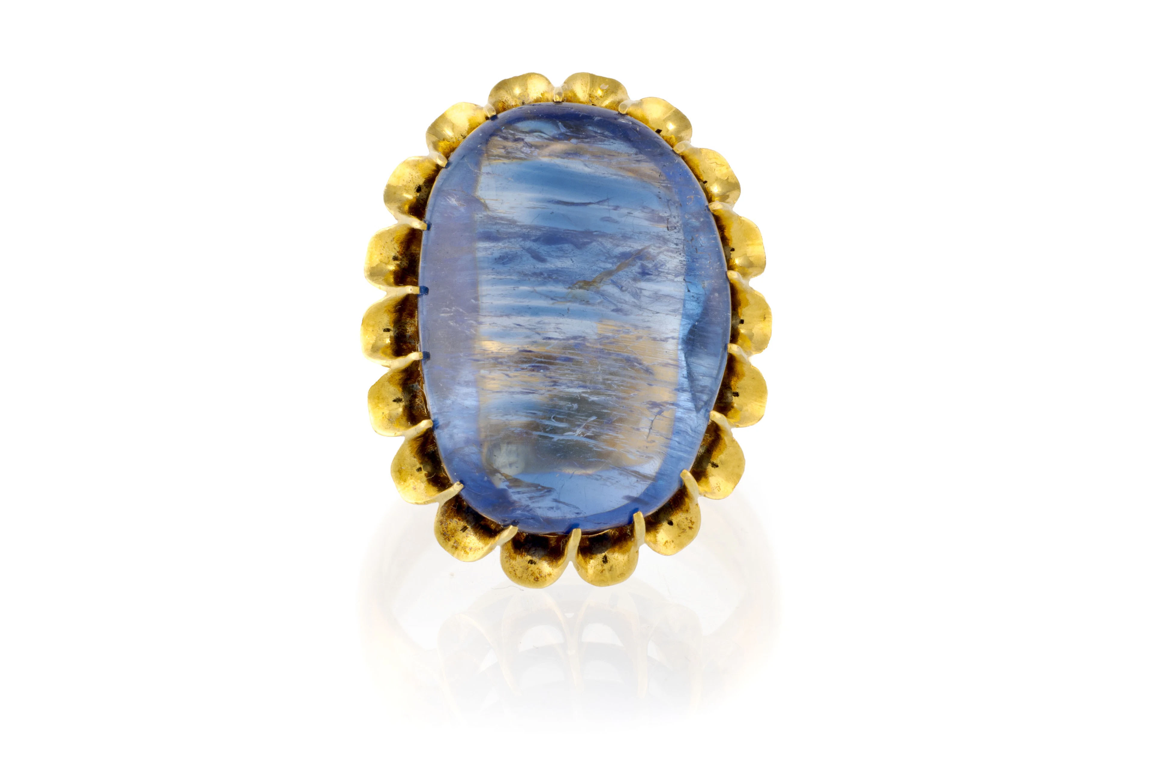 Bague or 750 sertie d'un saphir poli, doigt 53-13, 16g