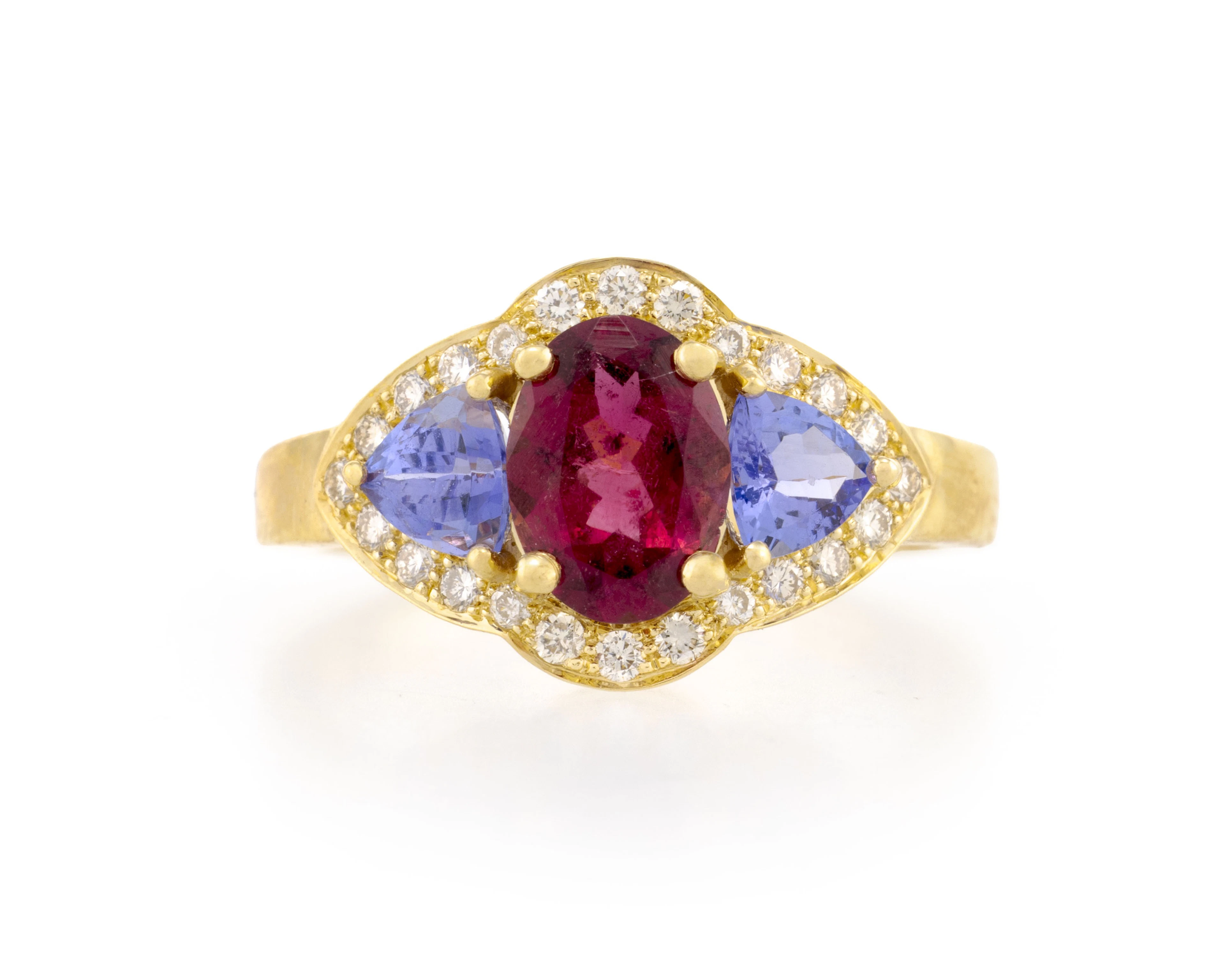 Bague or 750 sertie d'une tourmaline rose ovale épaulée de deux tanzanites