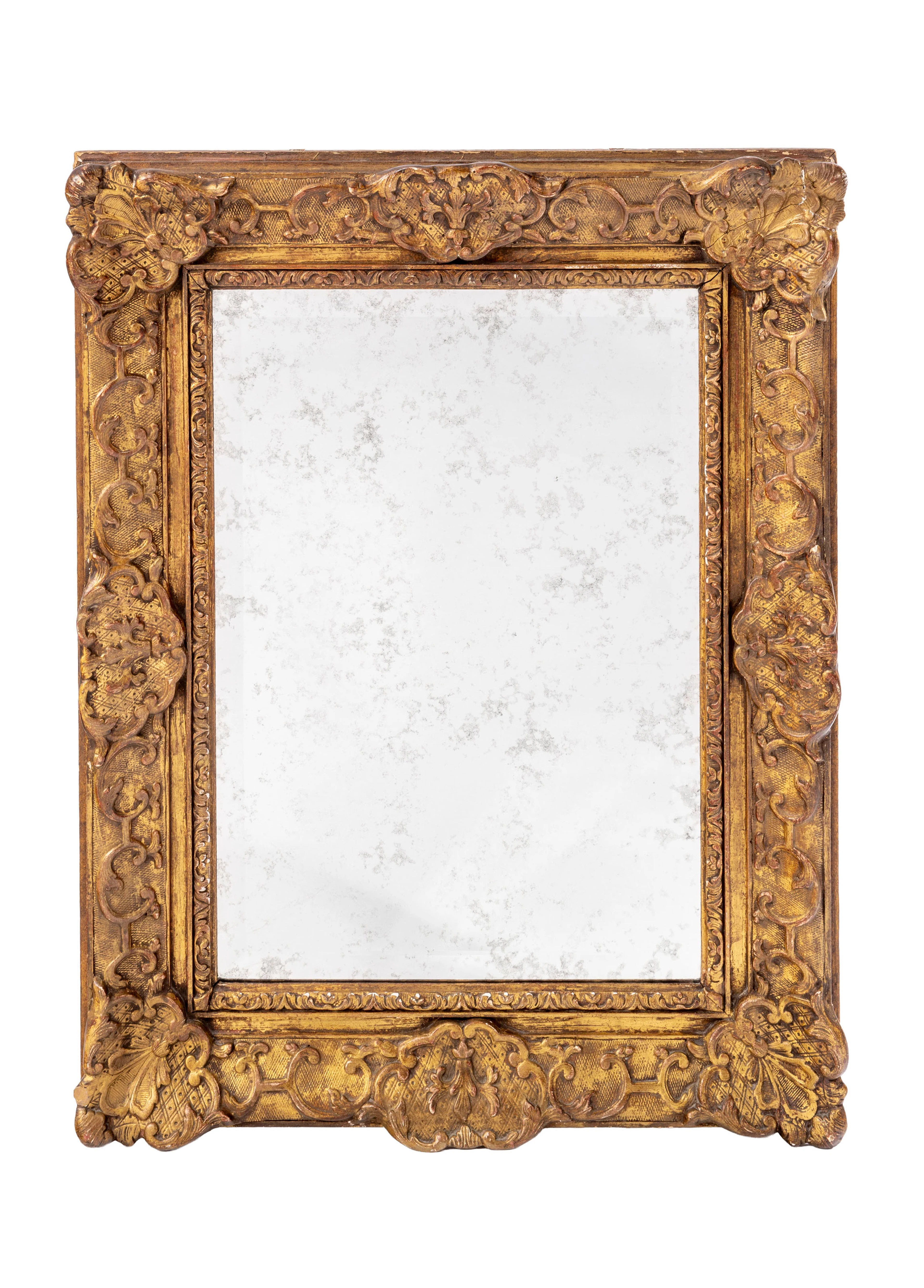 Miroir de style Régence, fin du XIXe s., bois et stuc doré à décor