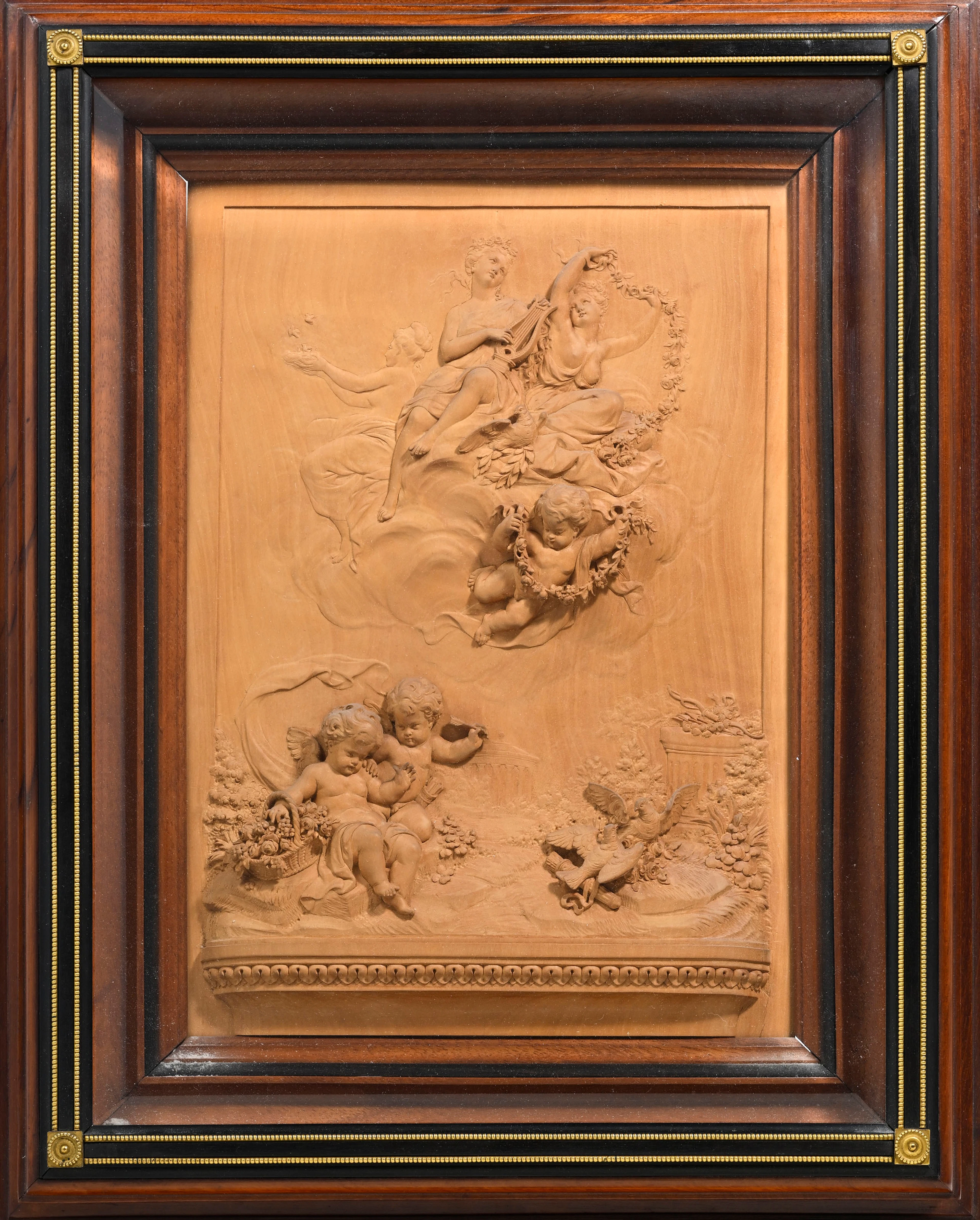 Ecole du XVIIIe s., bas relief en terre cuite à décor d'une allégorie