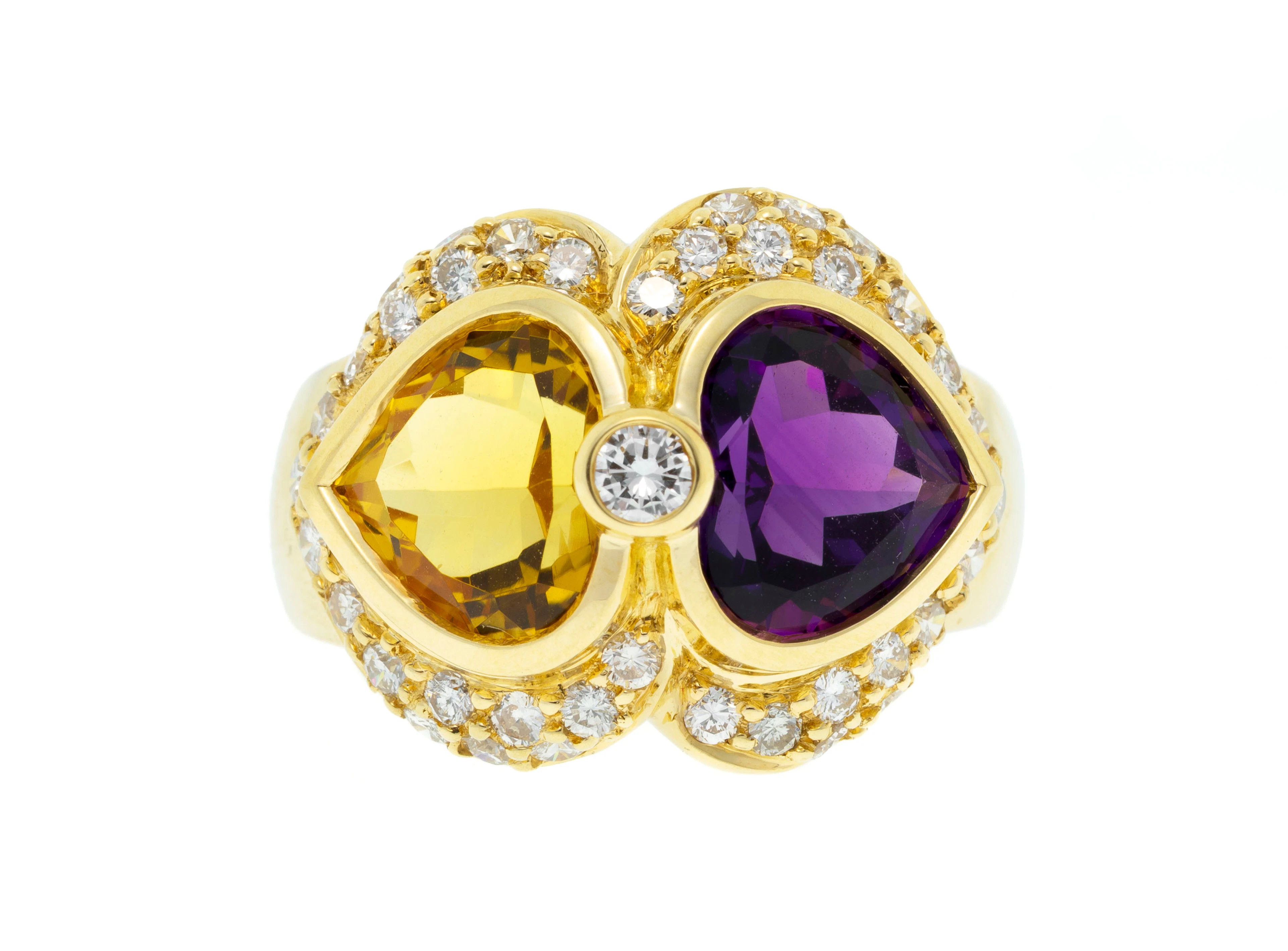 Bague or 750 opposant une améthyste et une citrine taillées en cœur