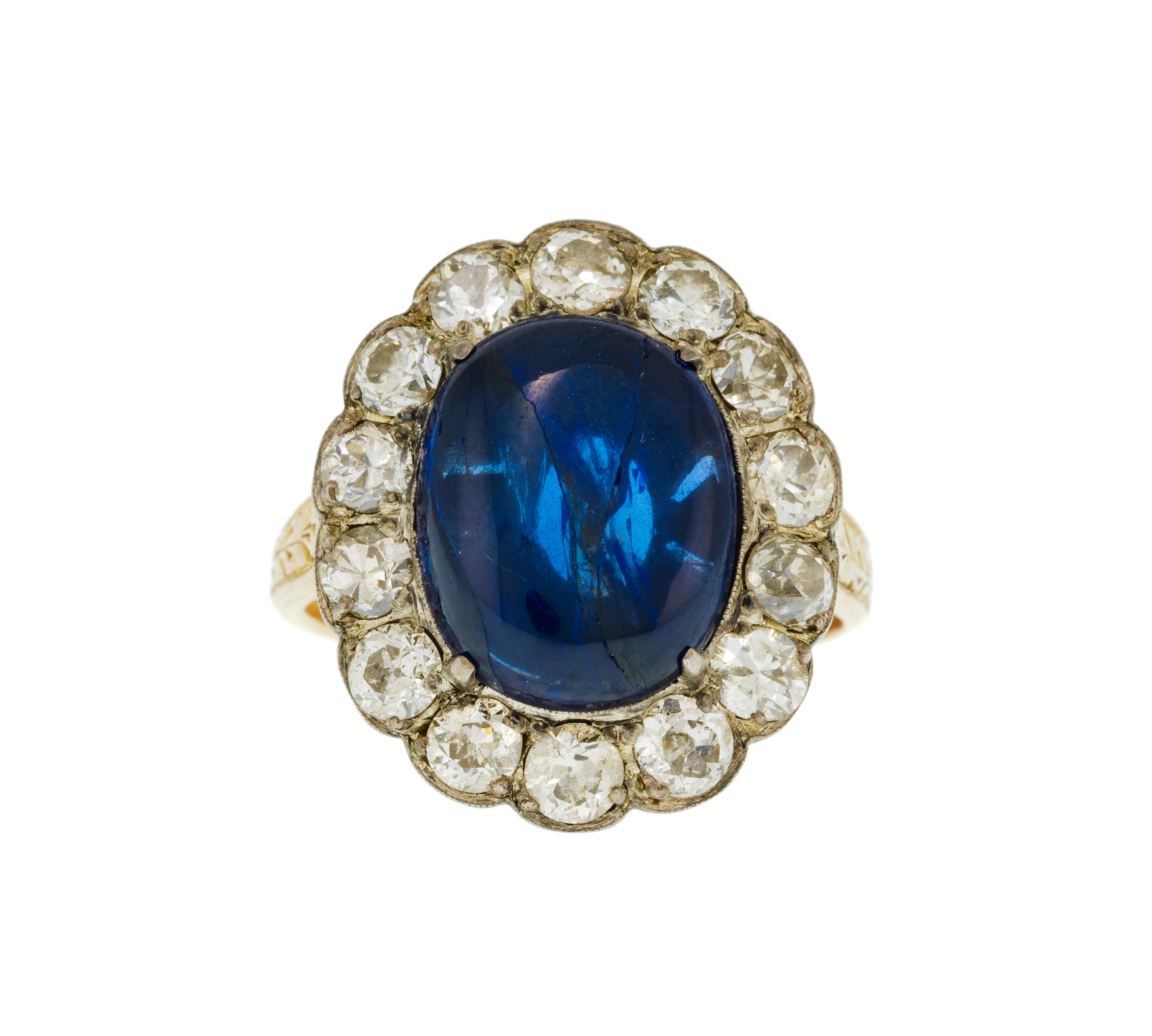 Bague en or rose 375 et argent sertie d'un saphir poli entouré de
