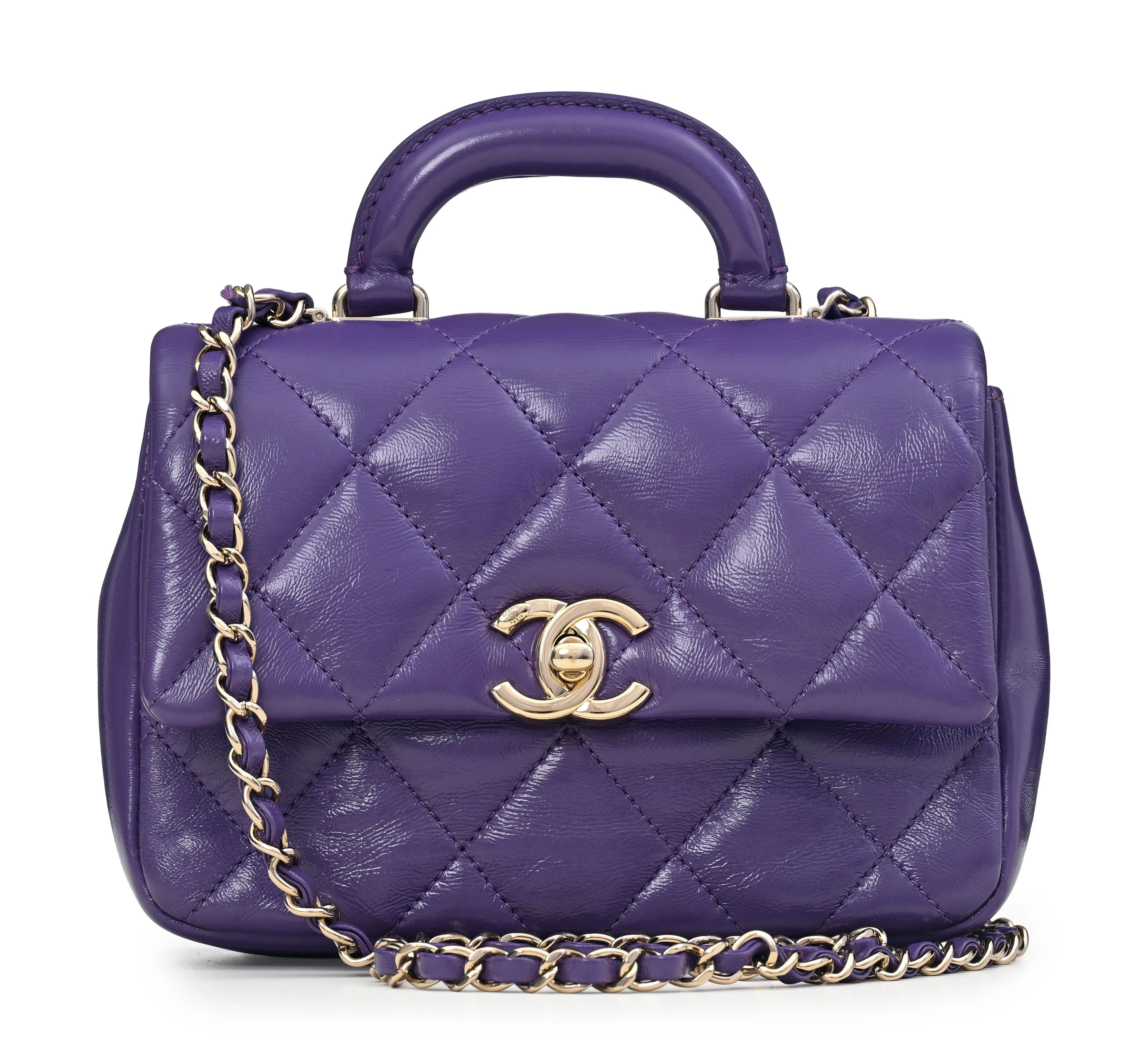 Chanel, sac à rabat Mini Coco Trip en cuir d'agneau indigo brillant