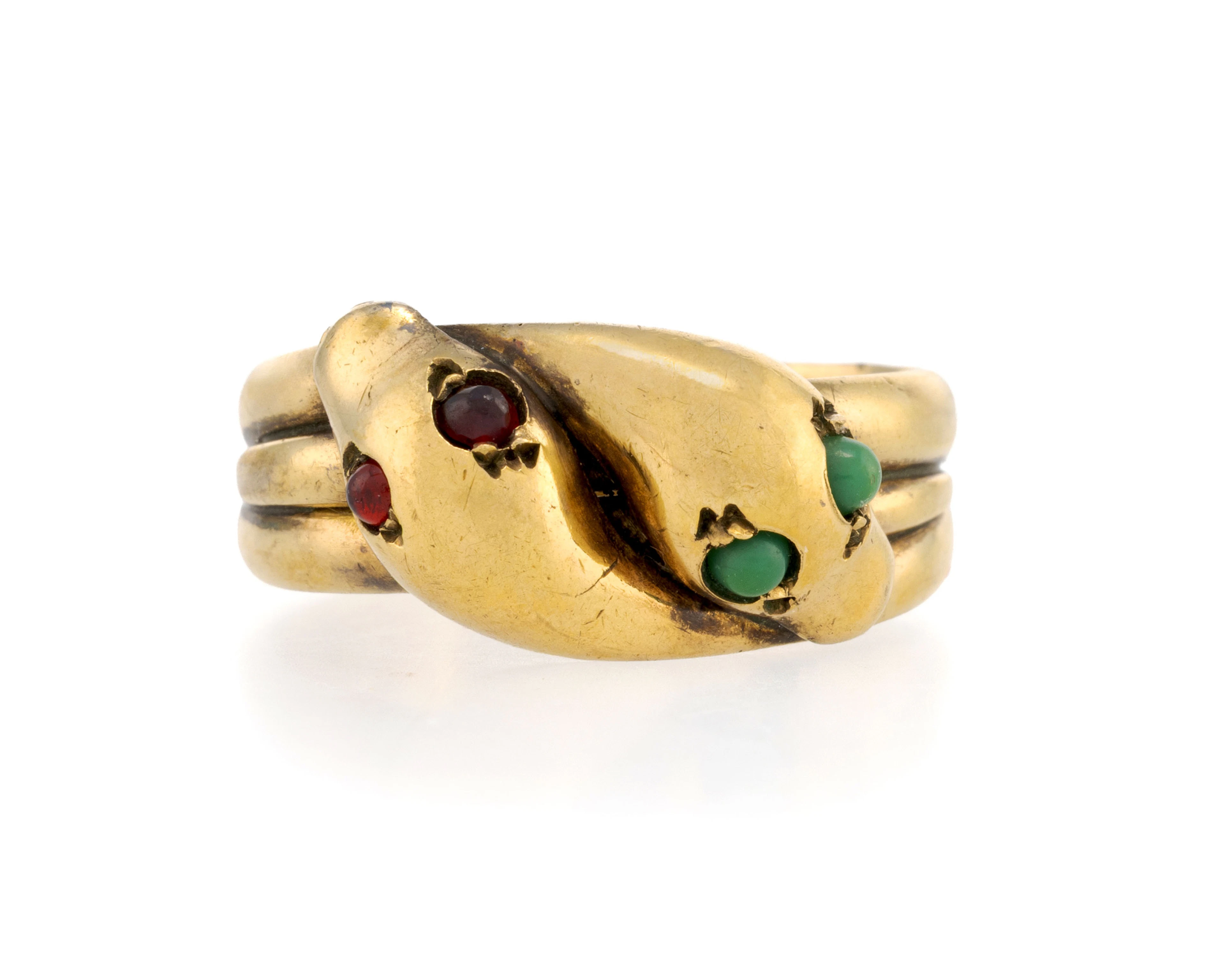 Bague XIXe s., or 375 figurant deux serpents enlacés, les yeux sertis