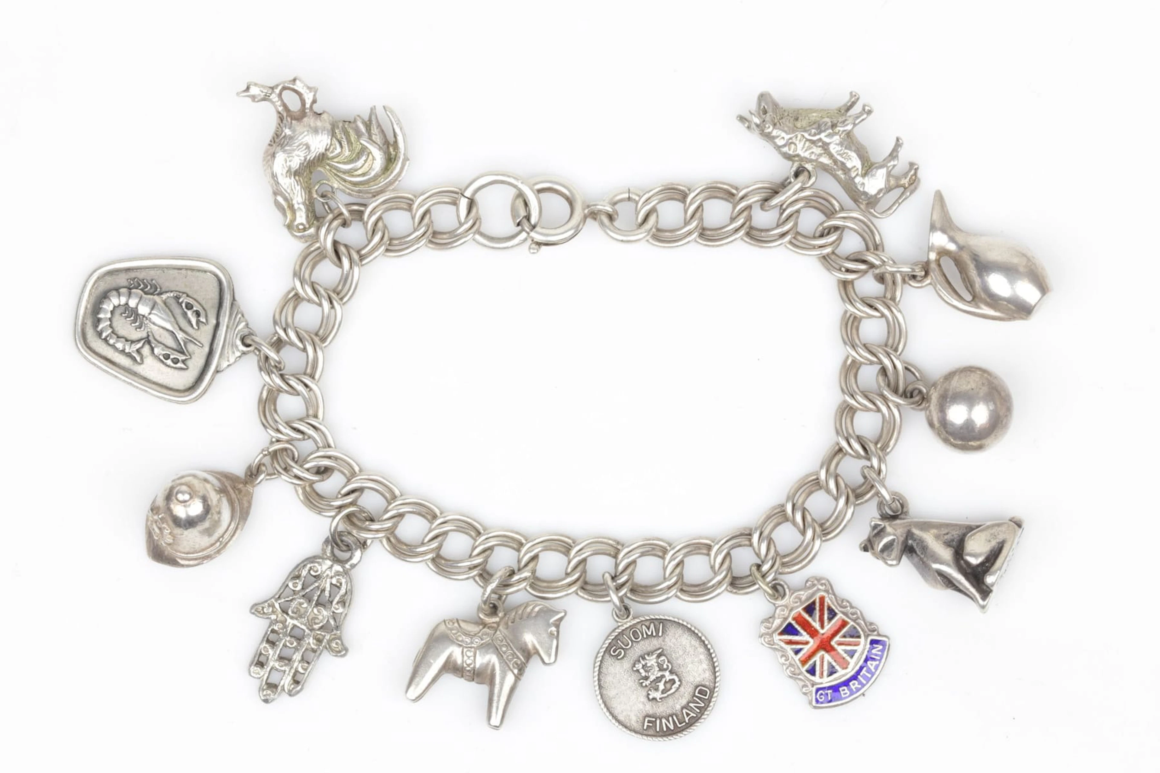 ARMBAND, bismarck, silver, med BERLOCKER, 11 st, varav 10 st, silver