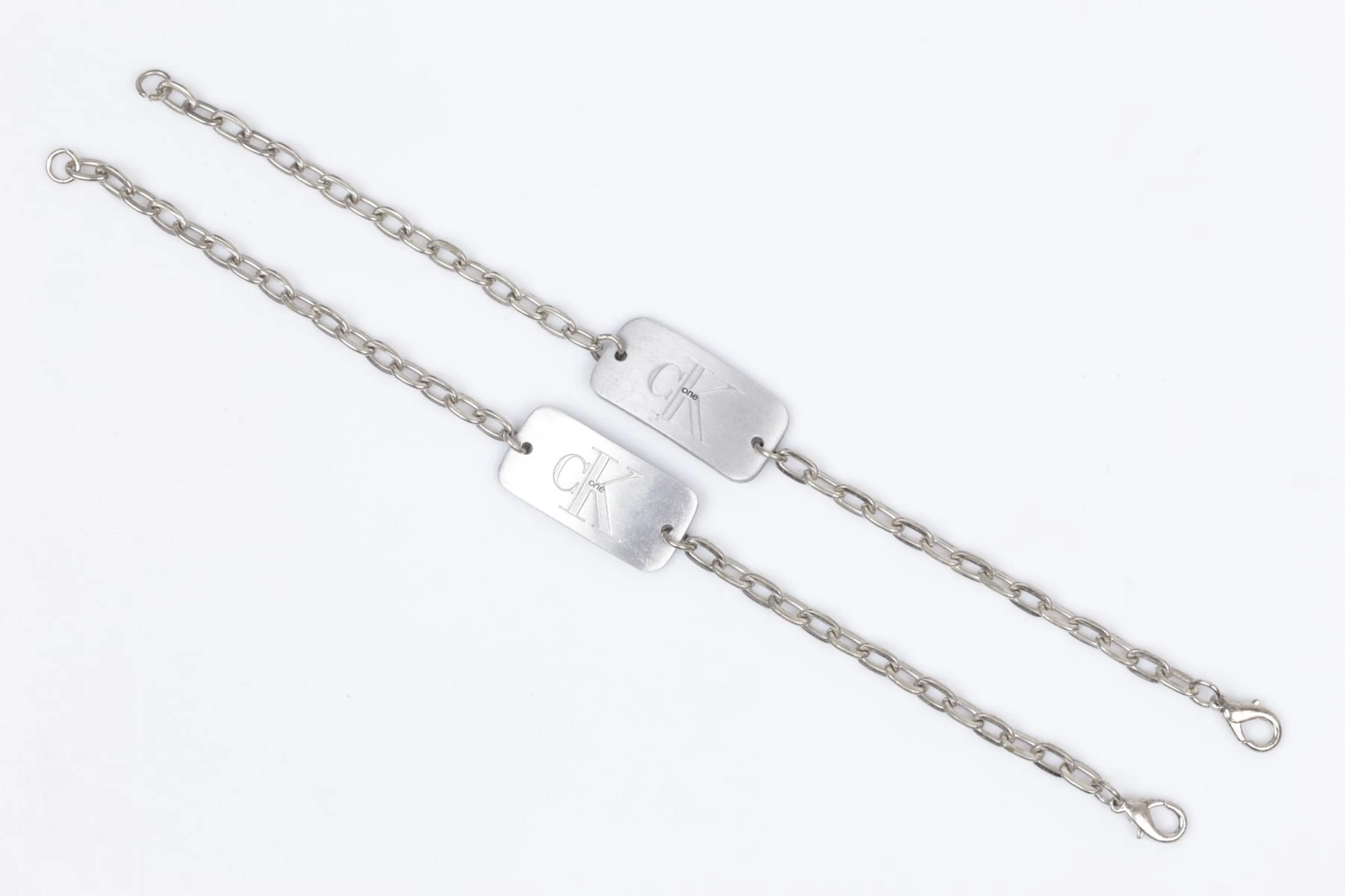 CALVIN KLEIN, armband, två st., aluminium, CK One