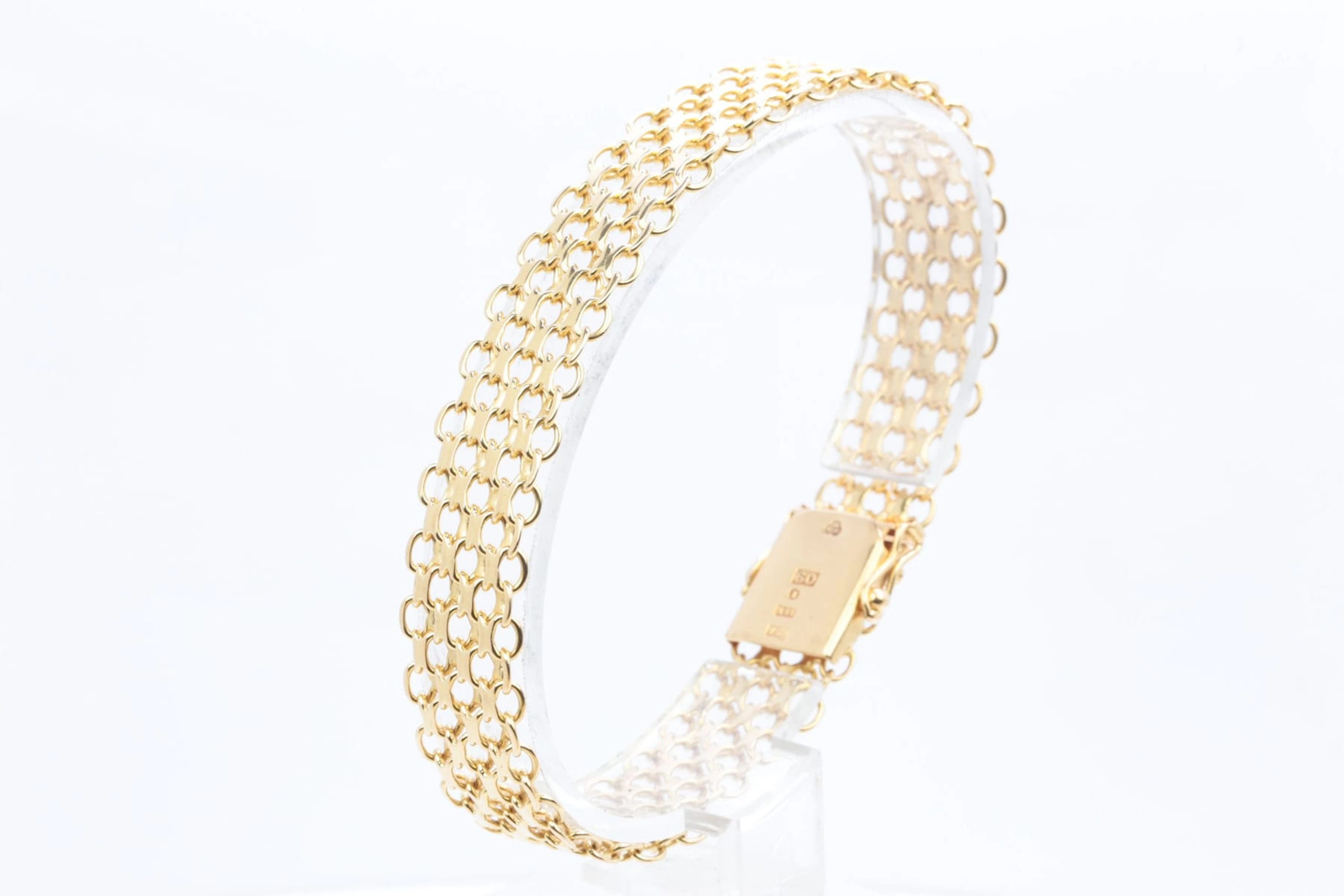 ARMBAND, bred x-länk, guld, 18 k, ca 25,90 g, Ädelsmycken Aktiebolag