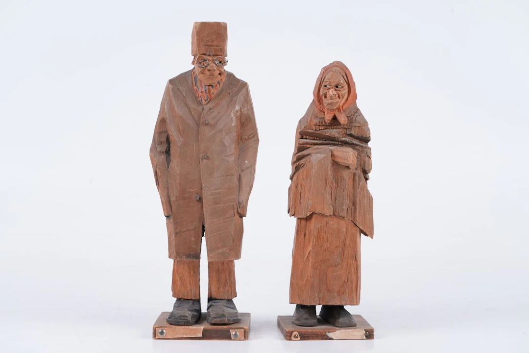 CARL JOHAN TRYGG (1887-1954), figuriner, 2 st, skuret trä, 1919