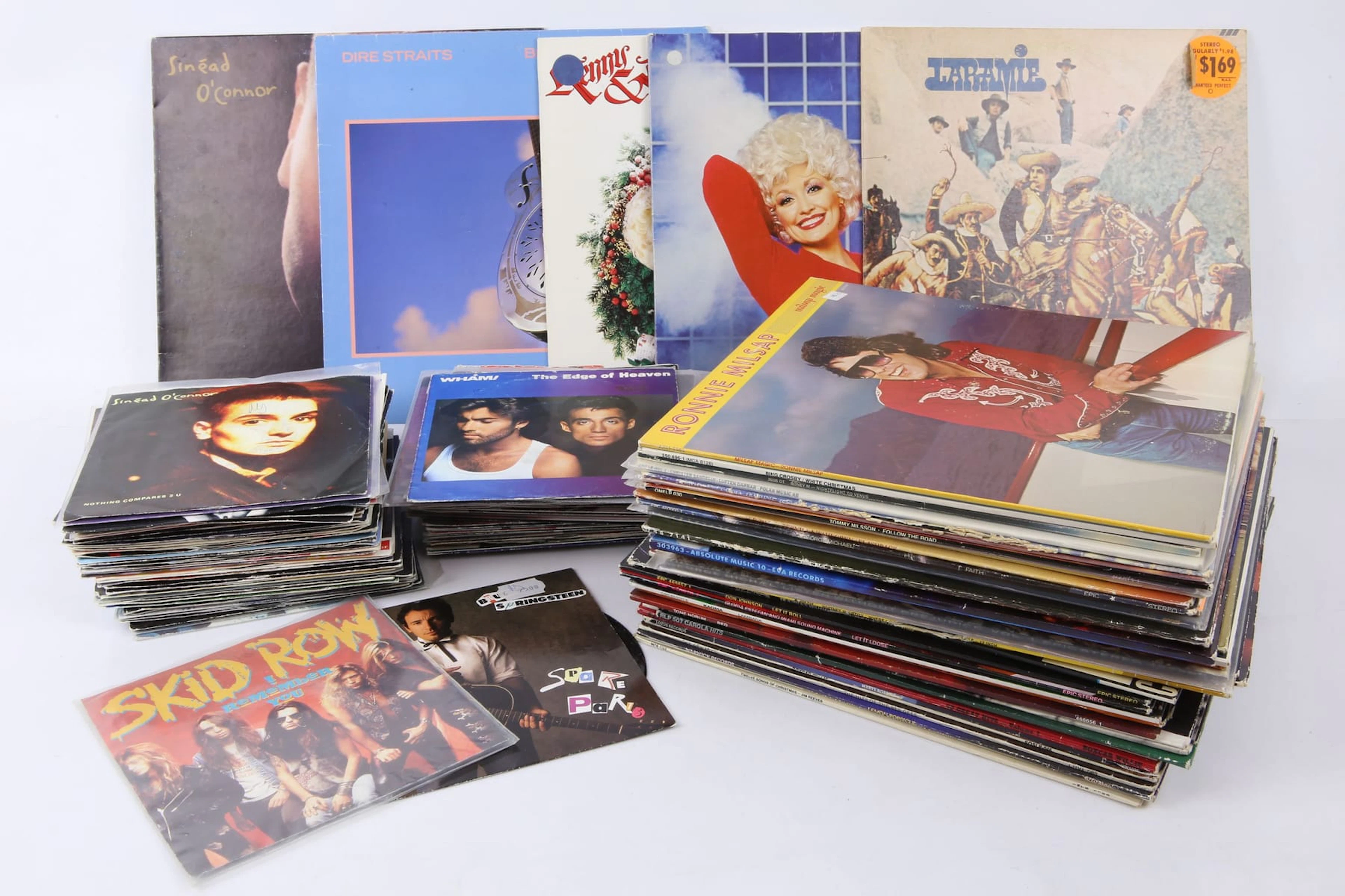 PARTI LP-SKIVOR,och SINGLAR, bl.a. Dire Straits, Dolly Parton, Sinead O'Connor