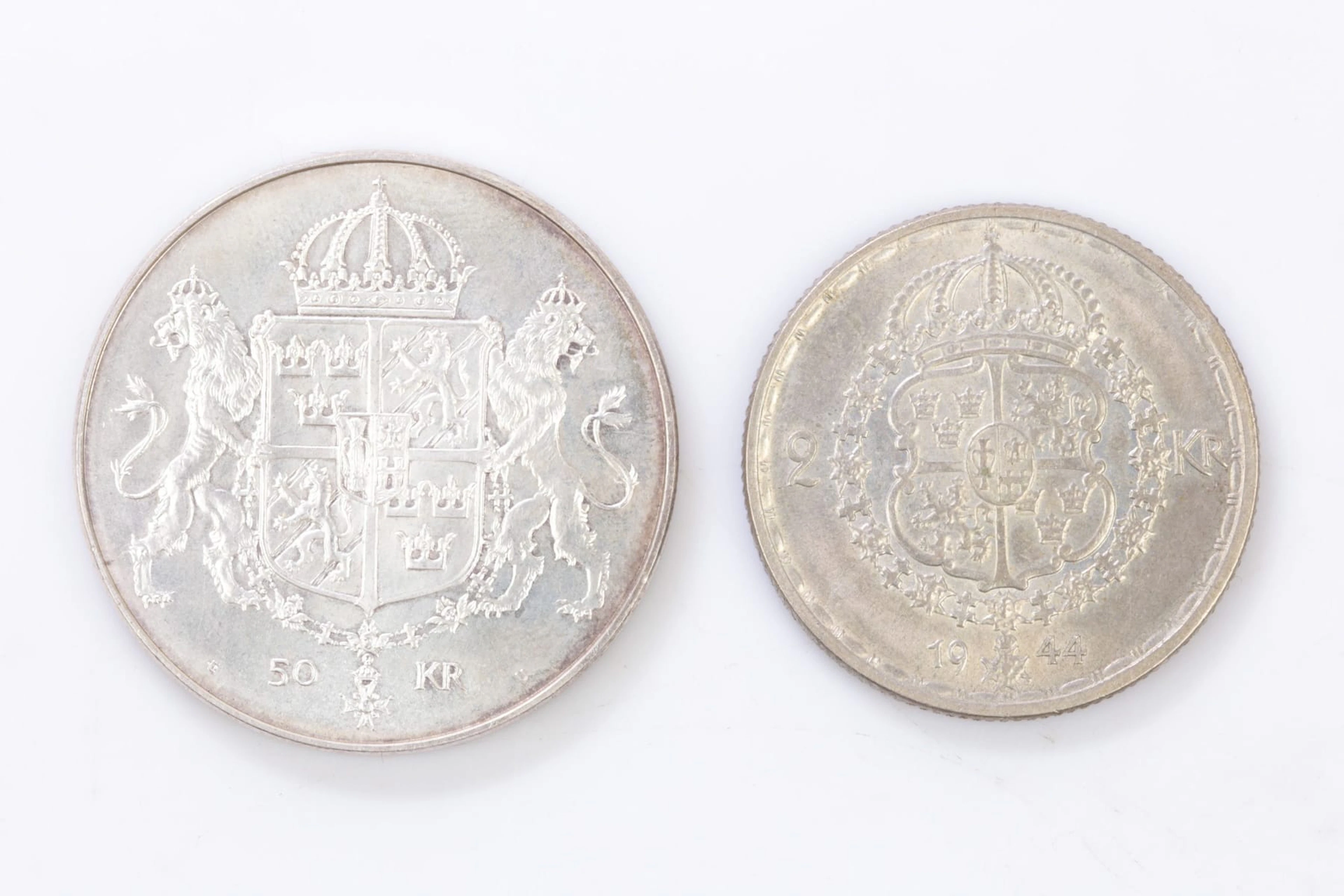 MYNT, 2 st, silver, á 50 kr, 1976, resp. á 2 kronor, 1948
