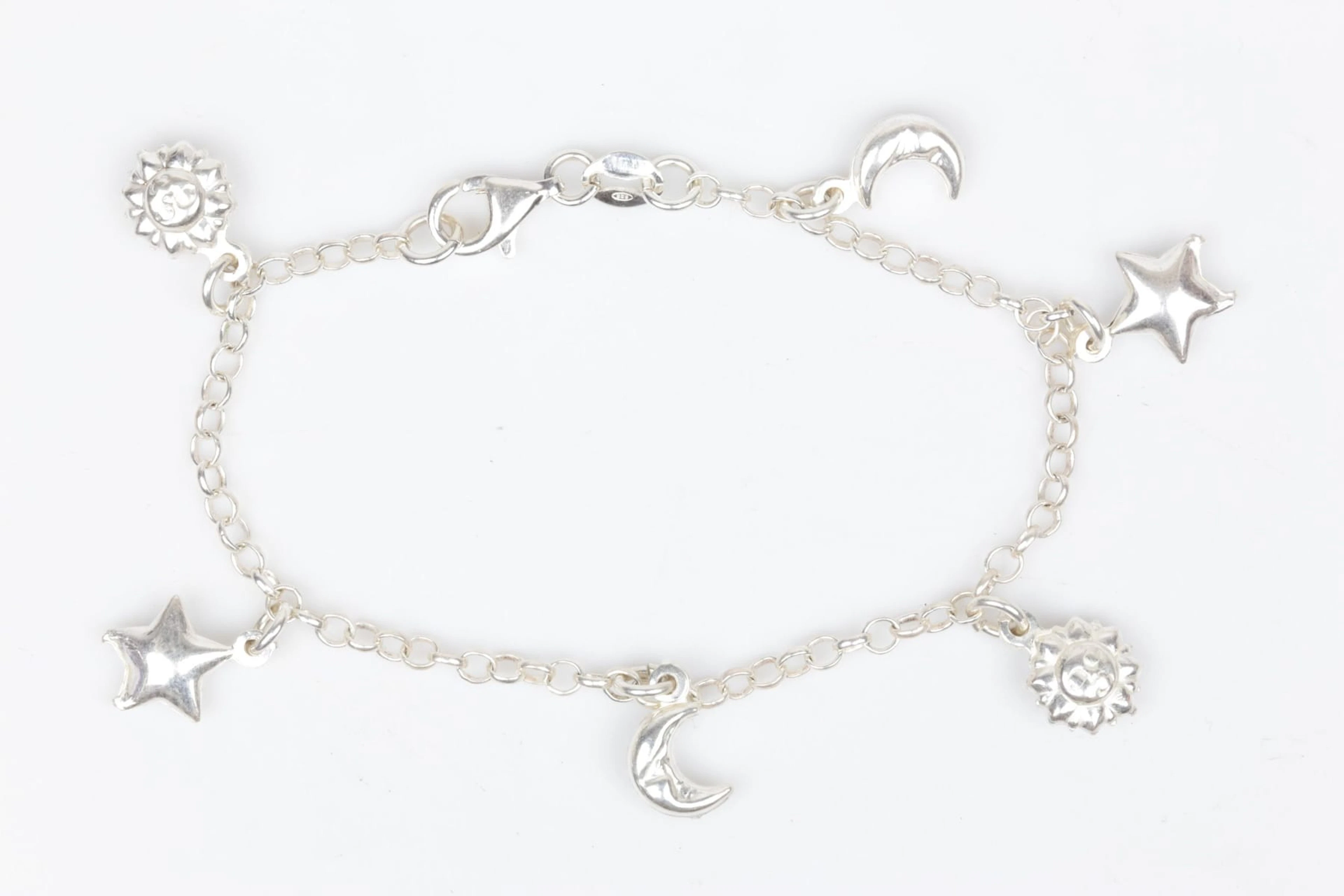 ARMBAND, ankar, med BERLOCKER, 6 st, silver, ca 6,43 g, Finland