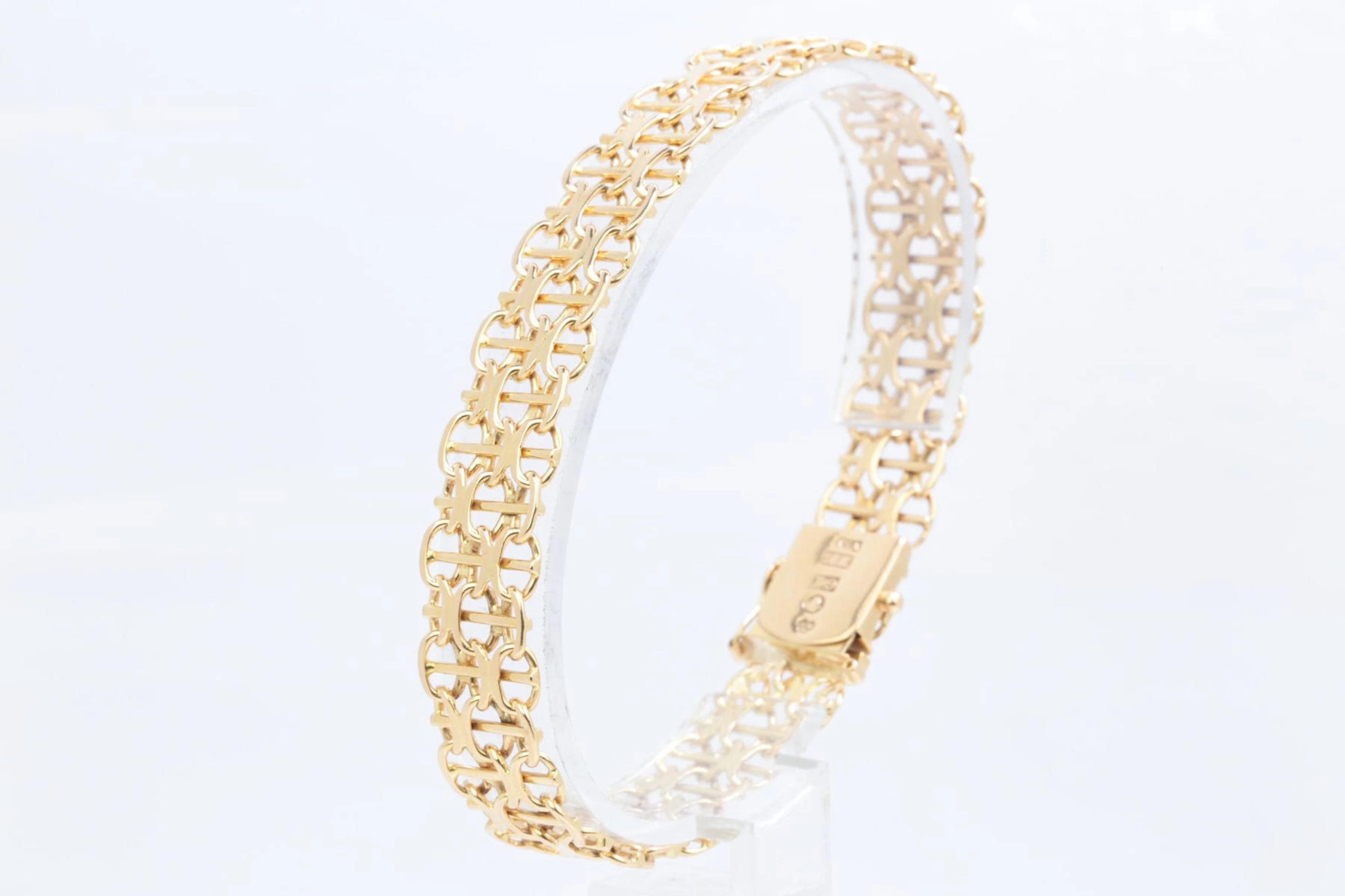 ARMBAND, x-länk med stav, guld, 18 k, ca 25,71 g, Ädelsmycken Aktiebolag