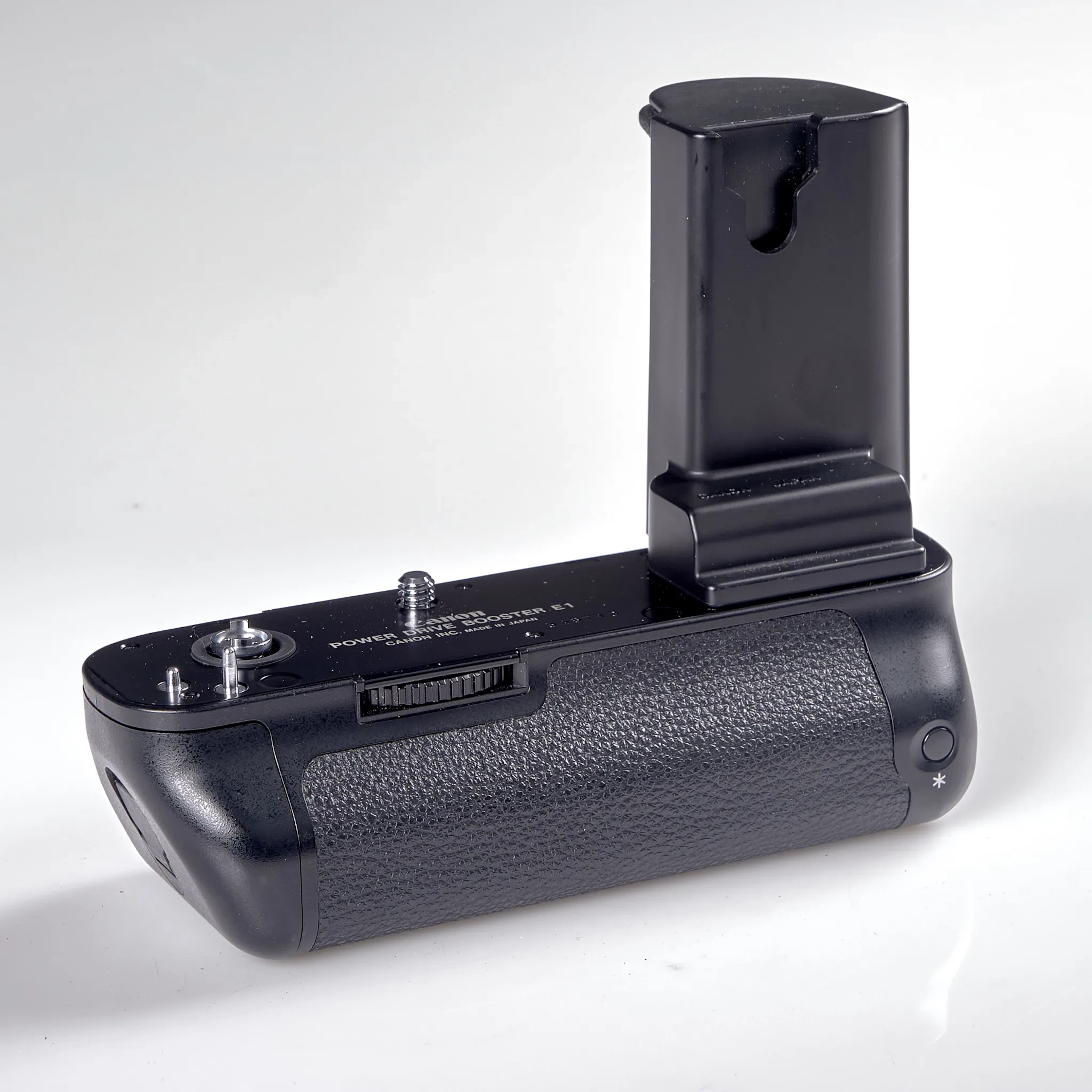 POWER DRIVE BOOSTER E1. Canon. Serienummer 546713. 1990-tal.