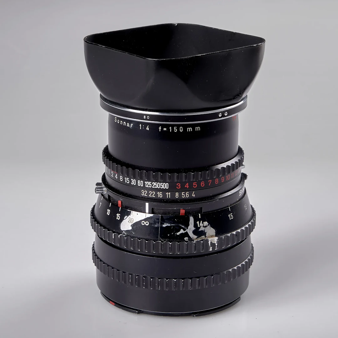 OBJEKTIV. Hasselblad. Sonnar 1:4 f=150 mm T* Carl Zeiss Nr6205928. Cirka 1980.