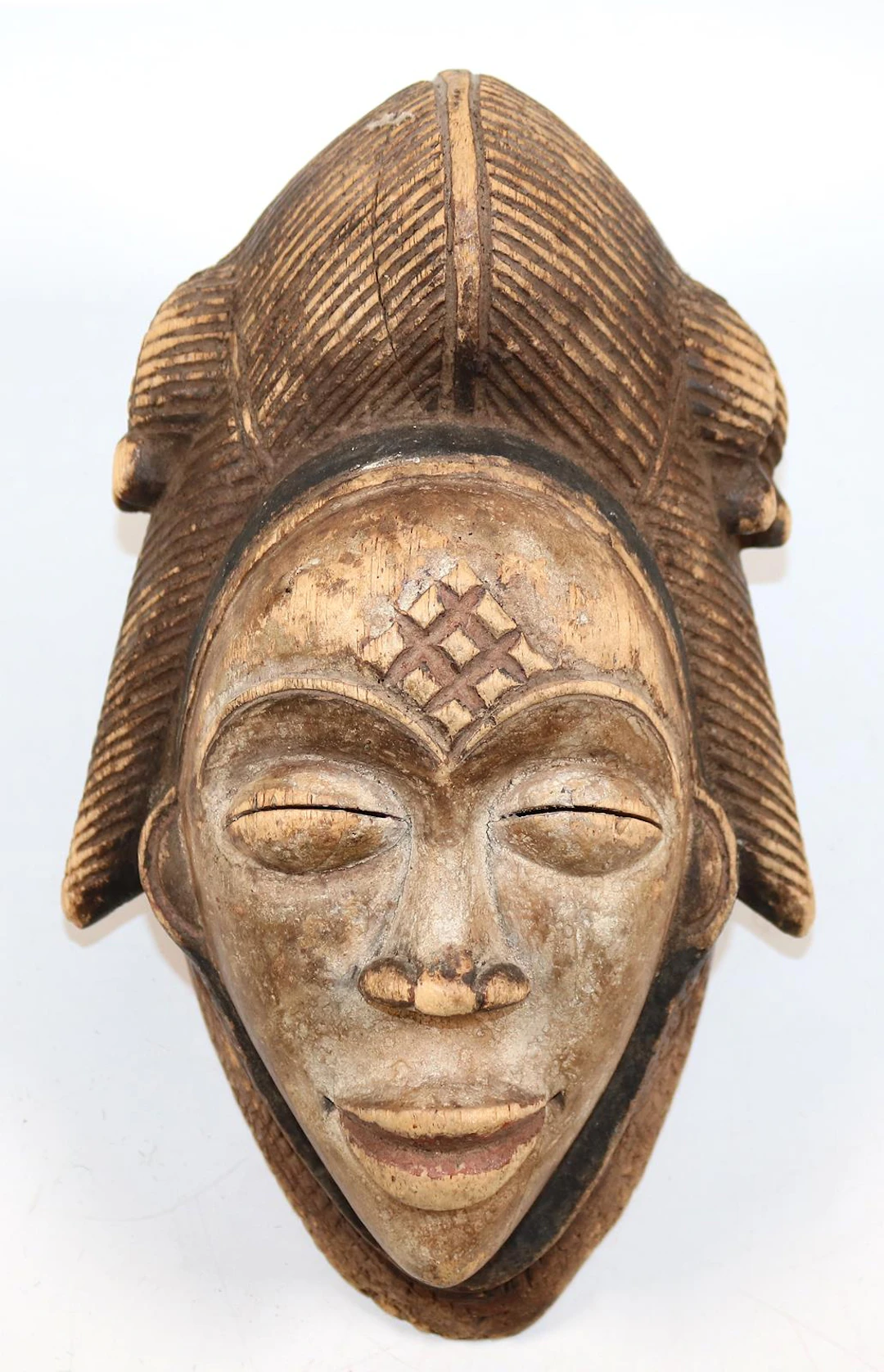 Punu Gabun Maske der Punu Gabun mit typischer Kammfrisur. Farbfassung