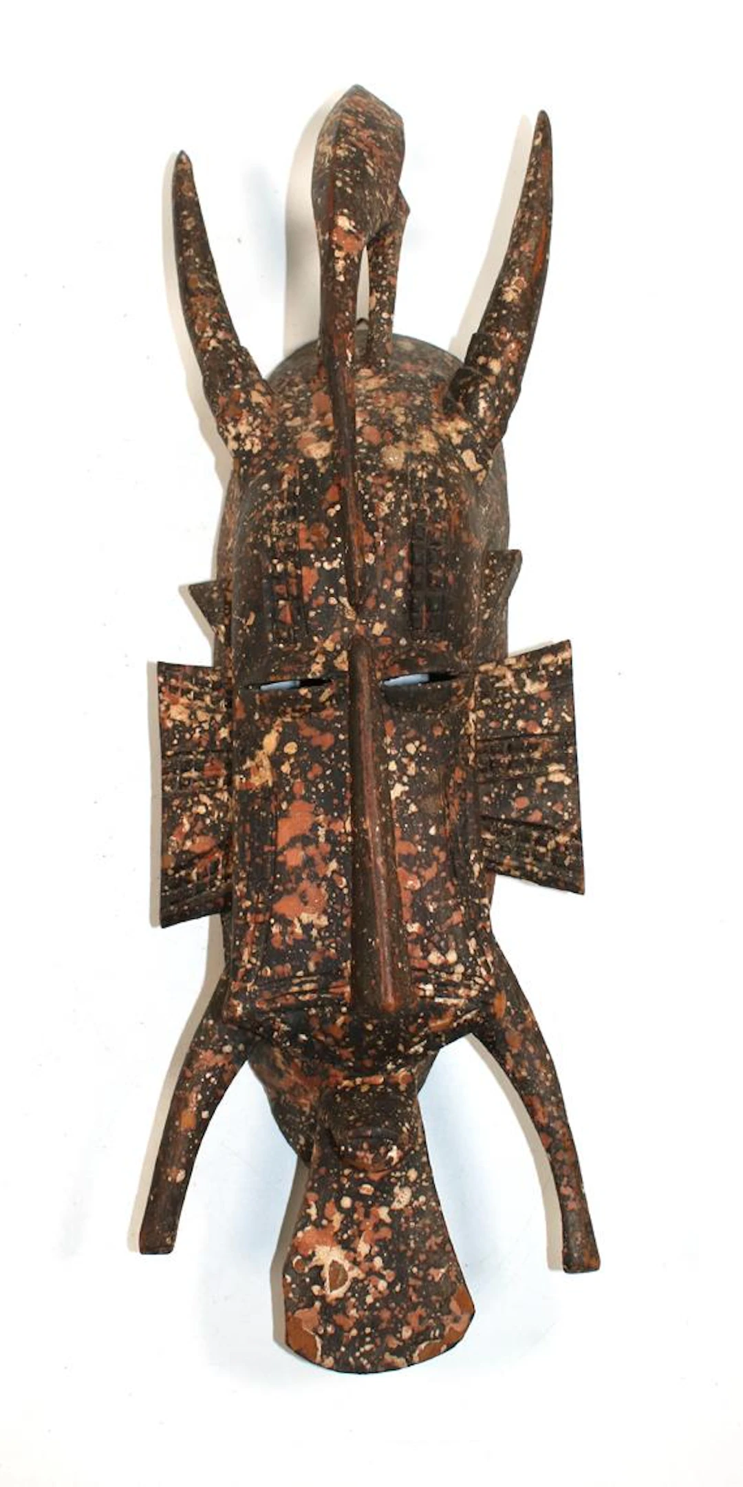 Kpelie Senufo. Maske mit Vogelaufsatz mit versch