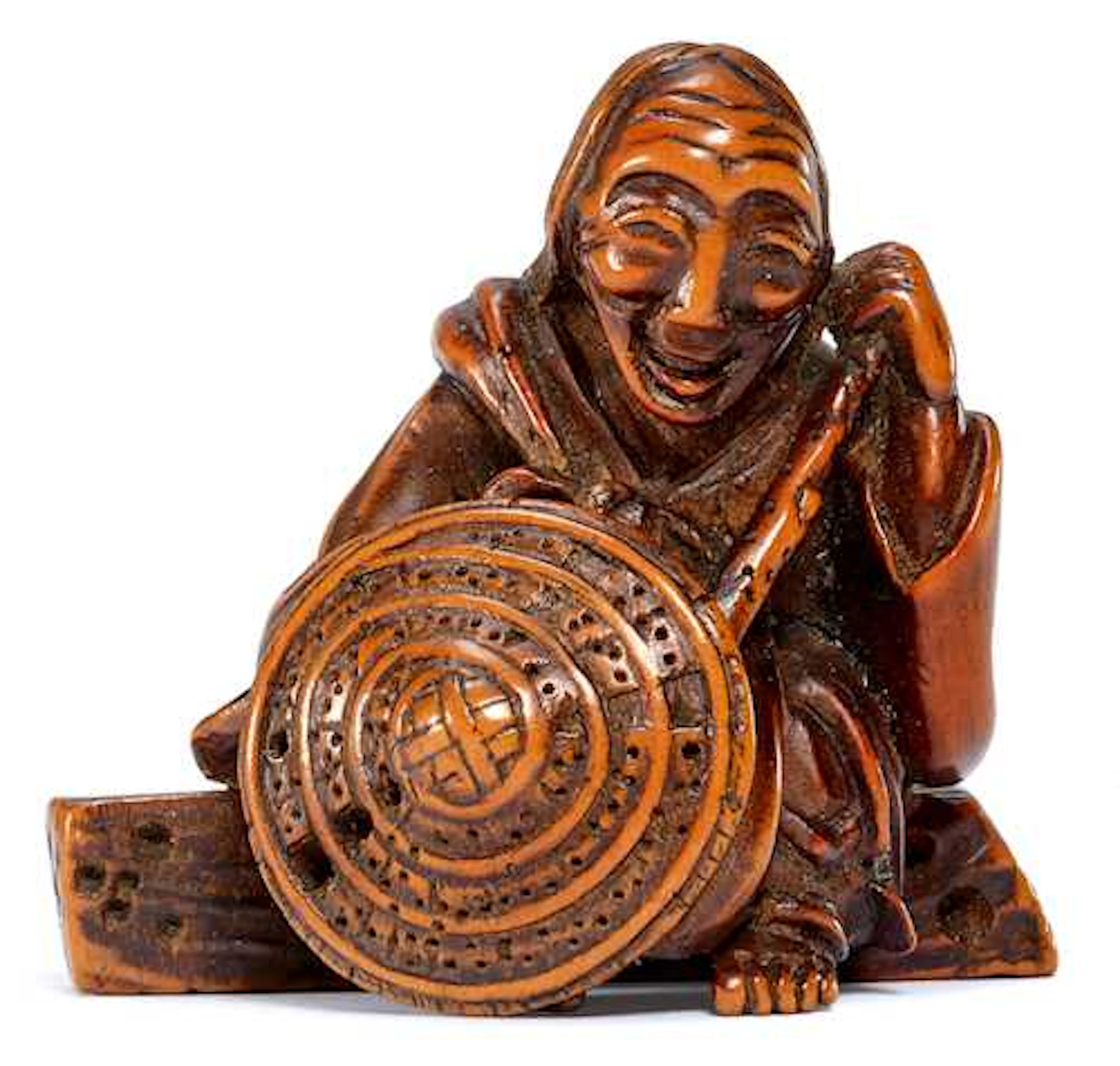 A WOOD NETSUKE OF SOTOBA KOMACHI