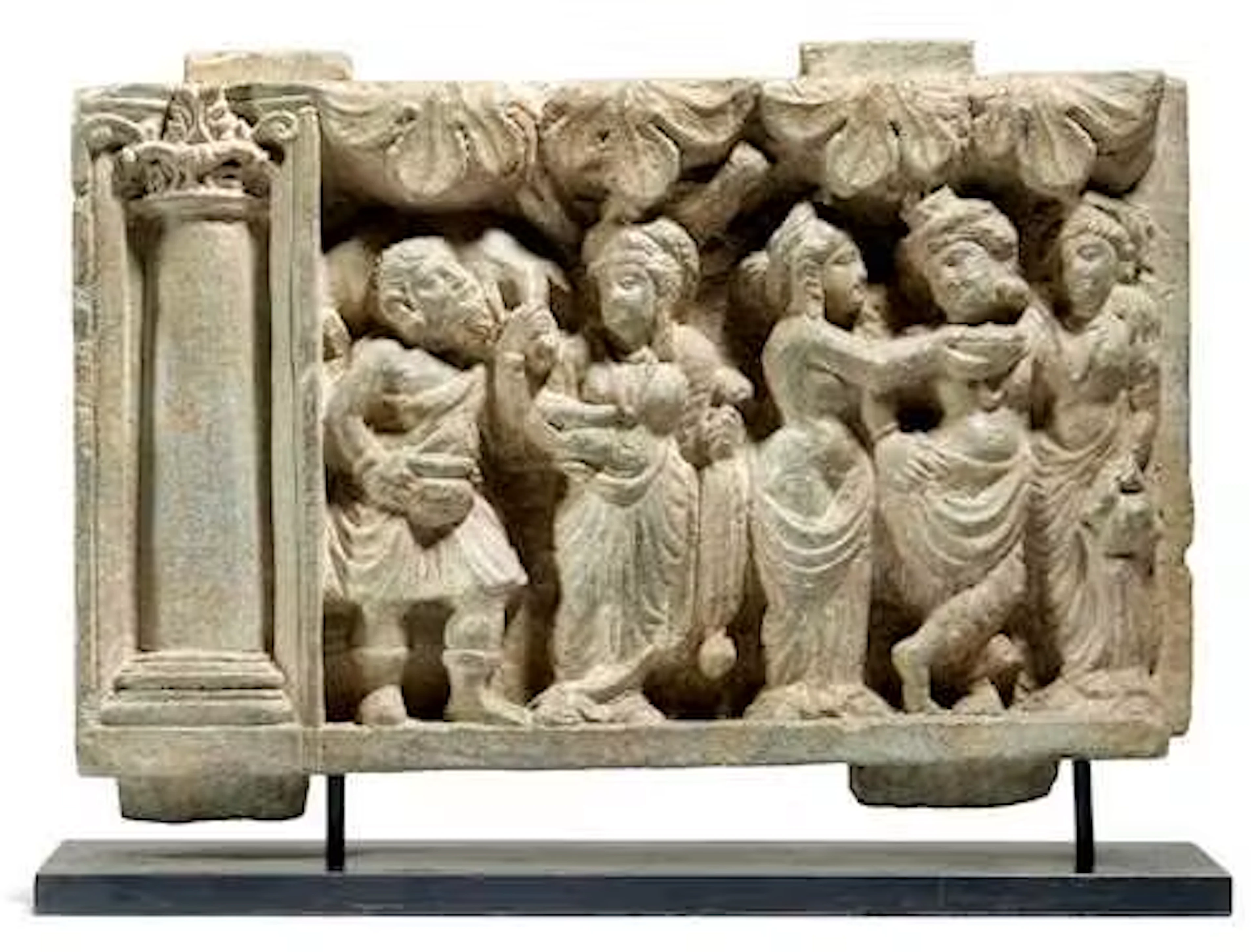 A SCHIST FRIEZE FRAGMENT DEPICTING A DIONYSIAN SCENE