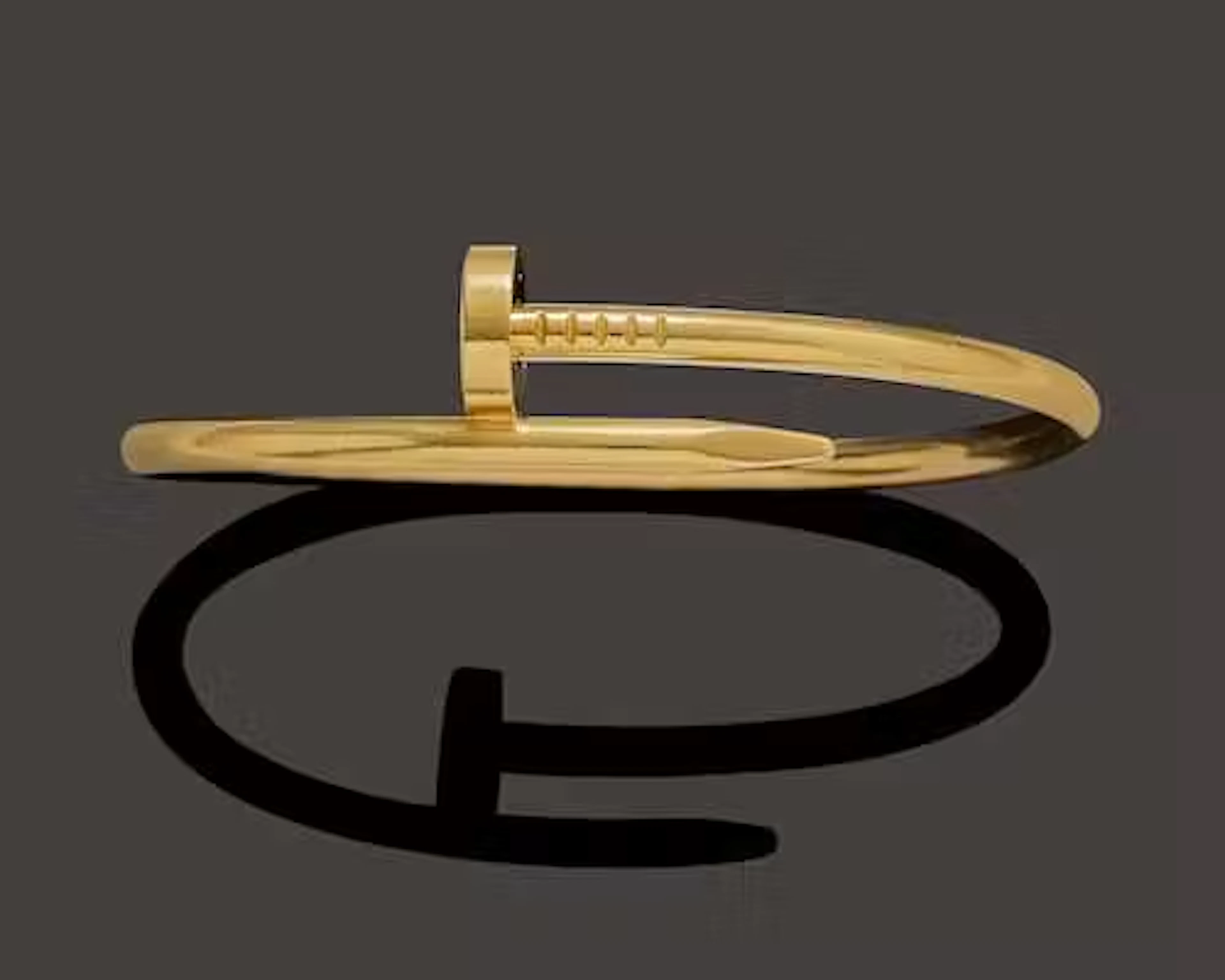 GOLD BANGLE, CARTIER