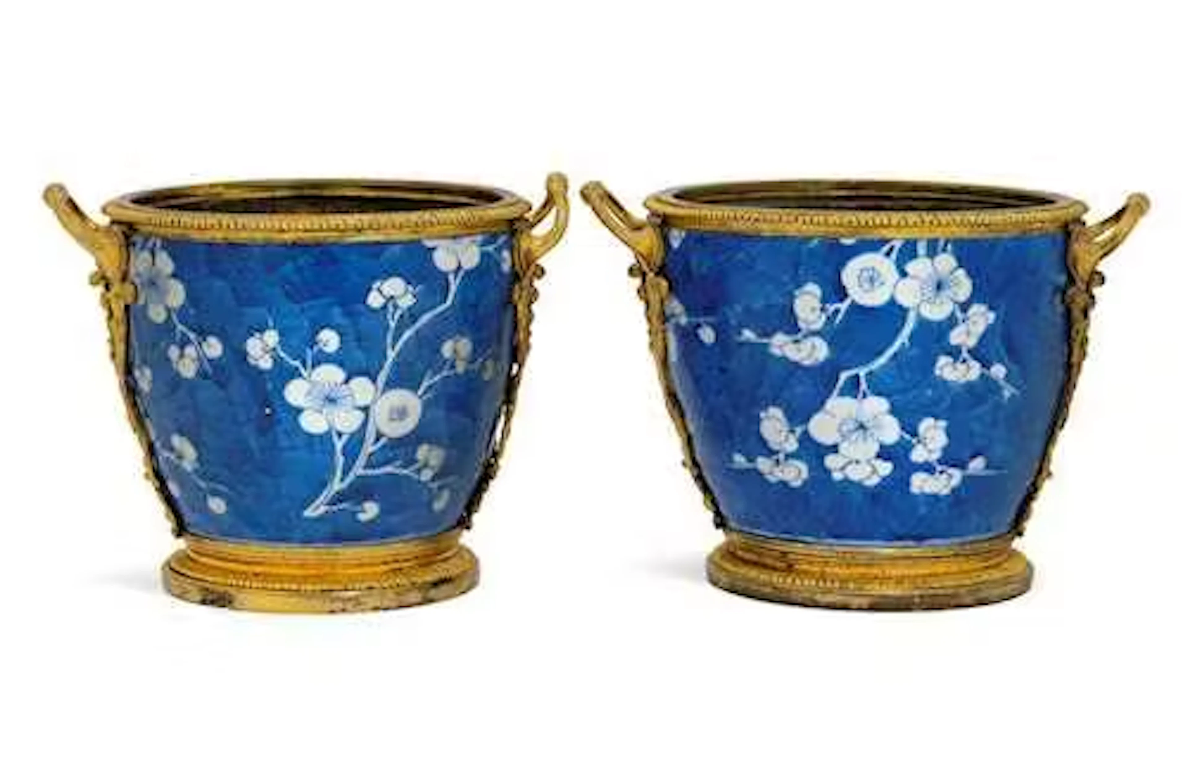 A PAIR OF MOUNTED CACHE-POTS