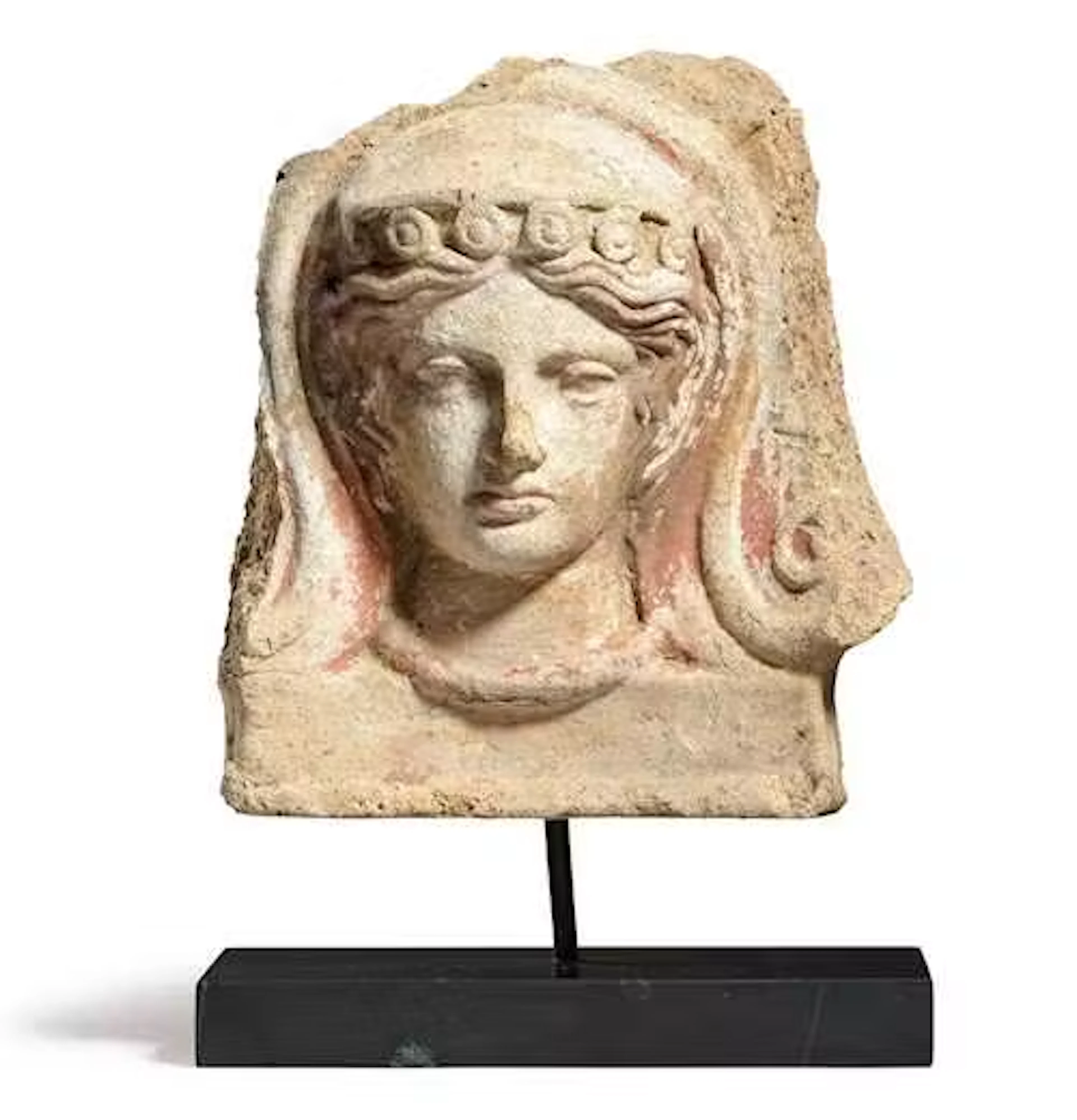 ANTEFIX IN THE FORM OF A WOMAN'S HEAD
