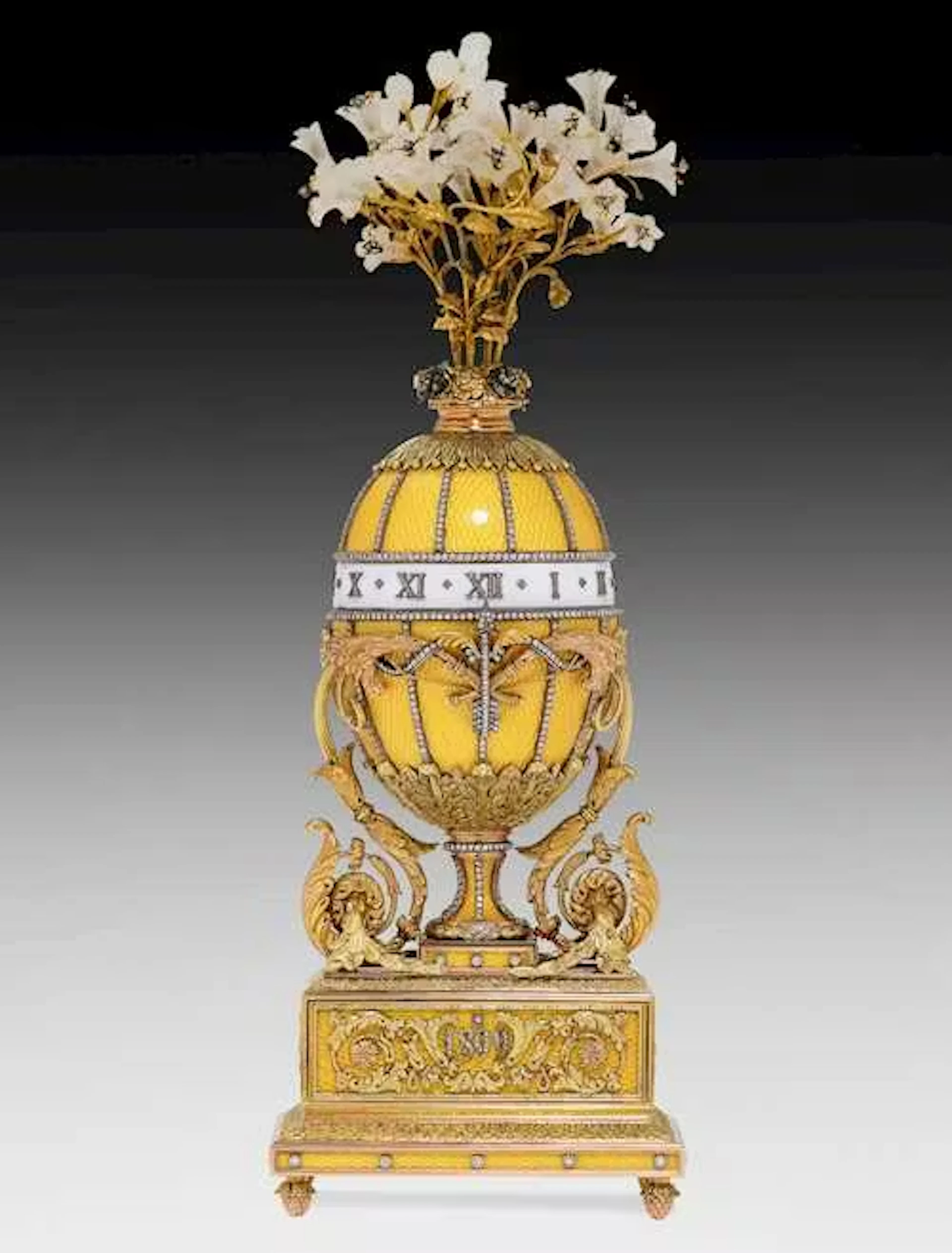 GOLD/ENAMEL CLOCK “AU CERCLE TOURNANT” DESIGNED AS AN EGG