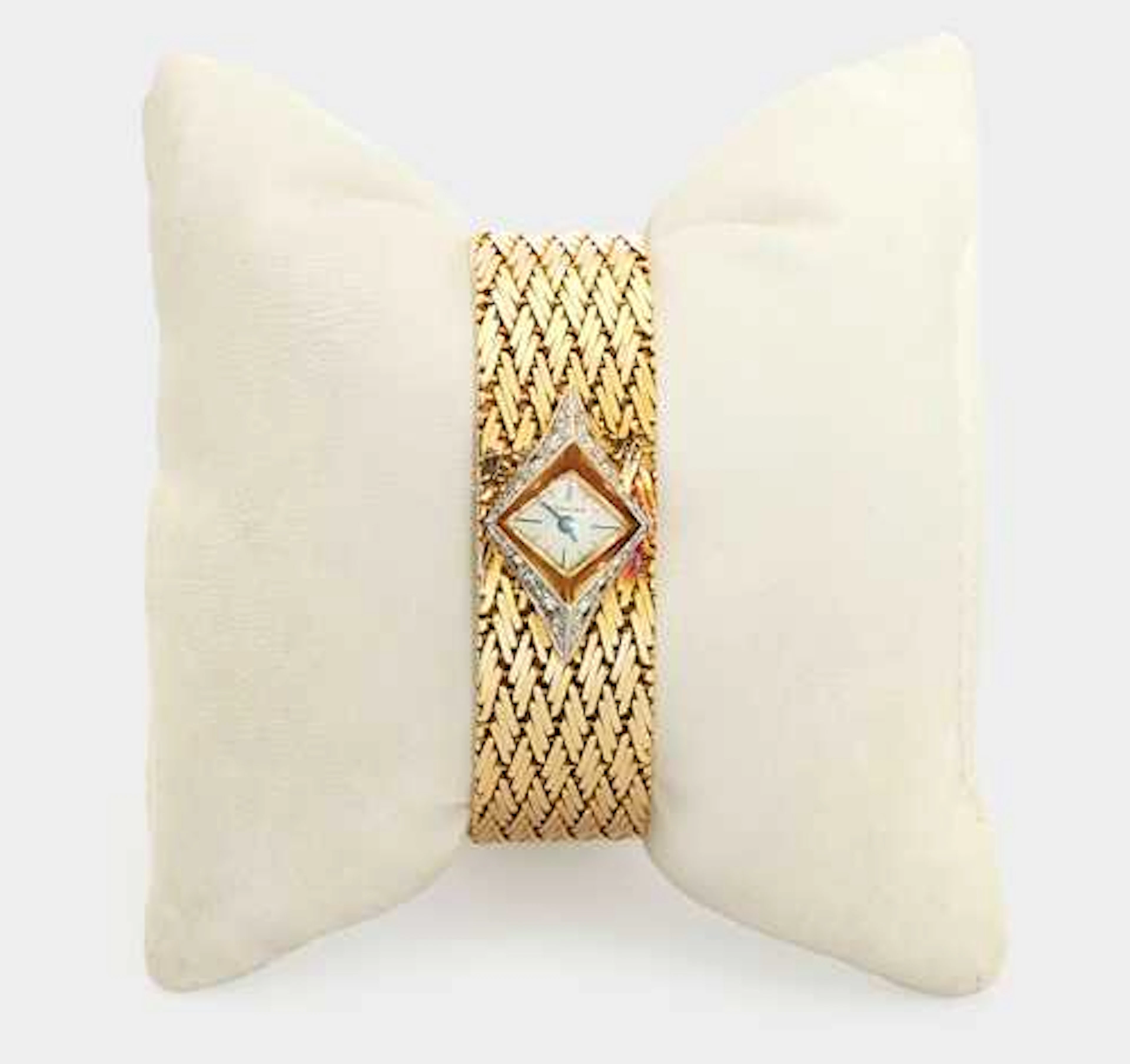 GOLD AND DIAMOND LADY’S WRISTWATCH, CARTIER, probably 1950s