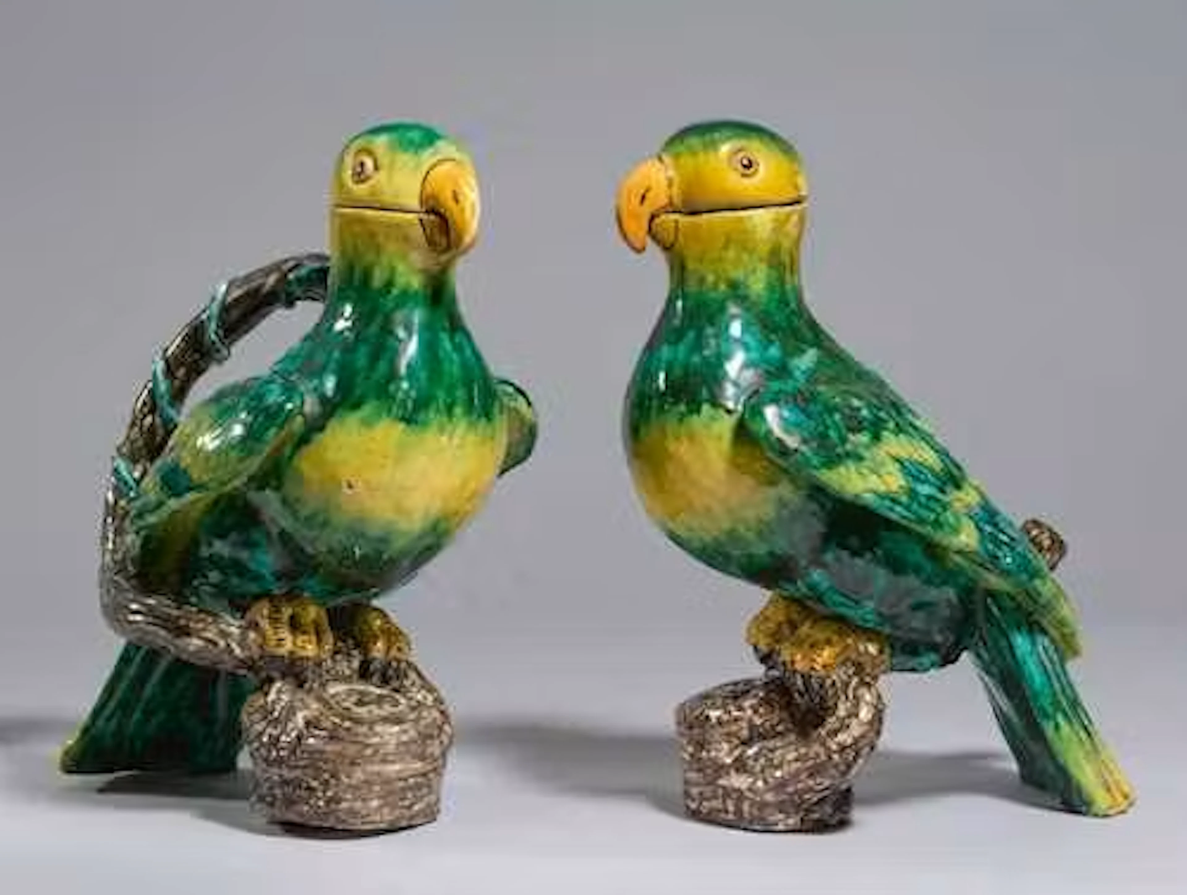 PAIR OF PARROT EWERS