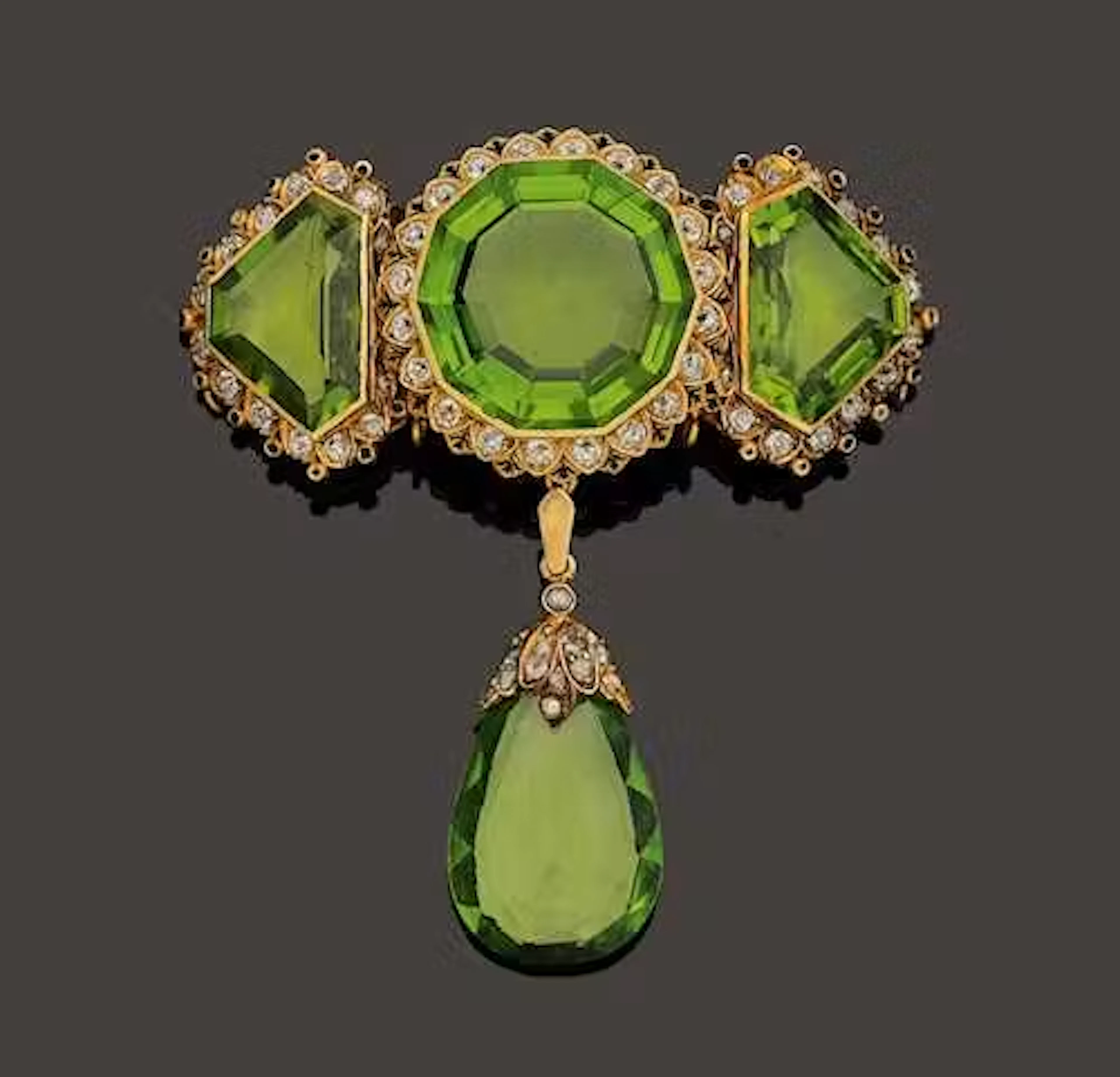 PERIDOT AND DIAMOND BROOCH, probably England