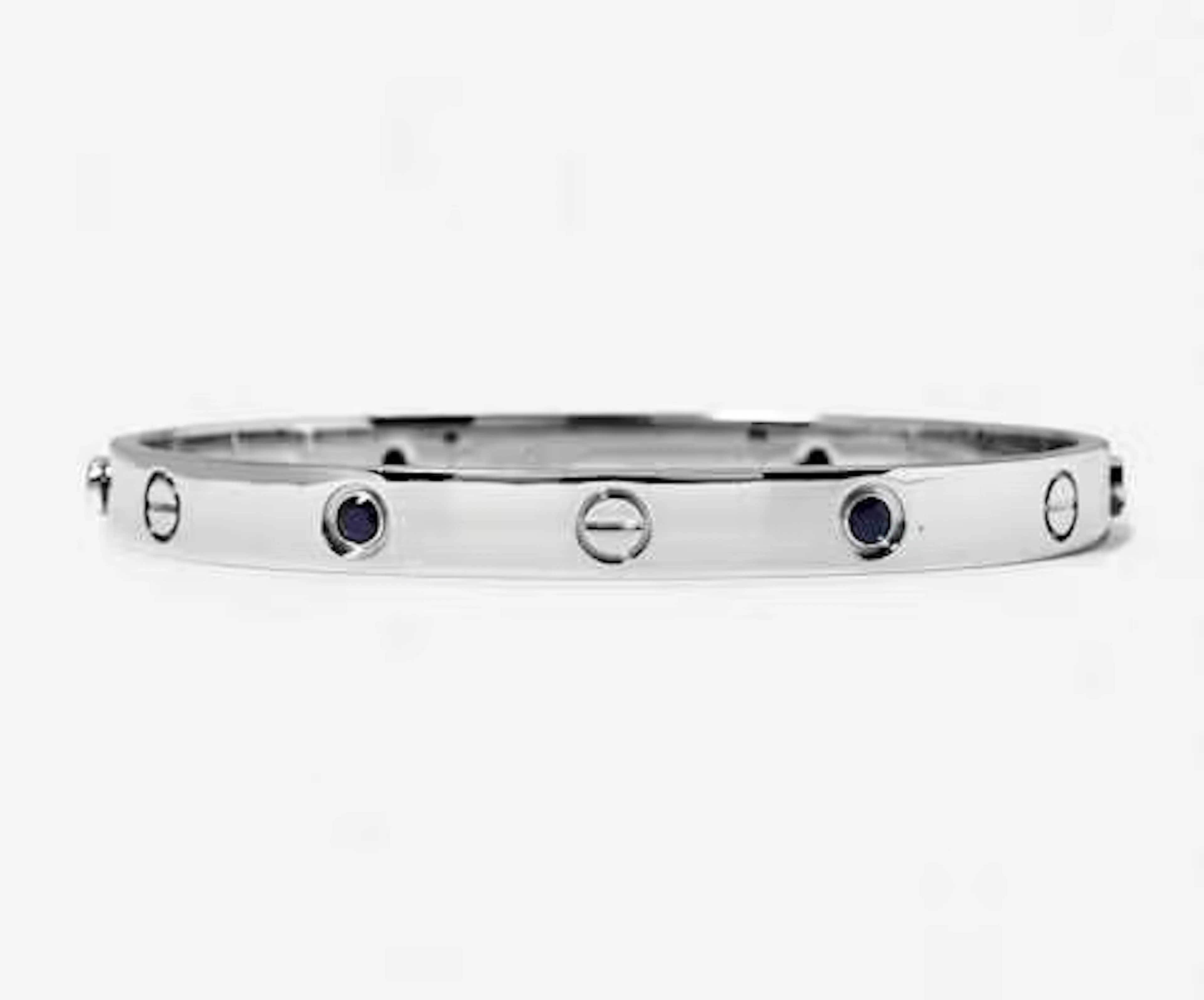 GOLD AND SAPPHIRE BANGLE, CARTIER