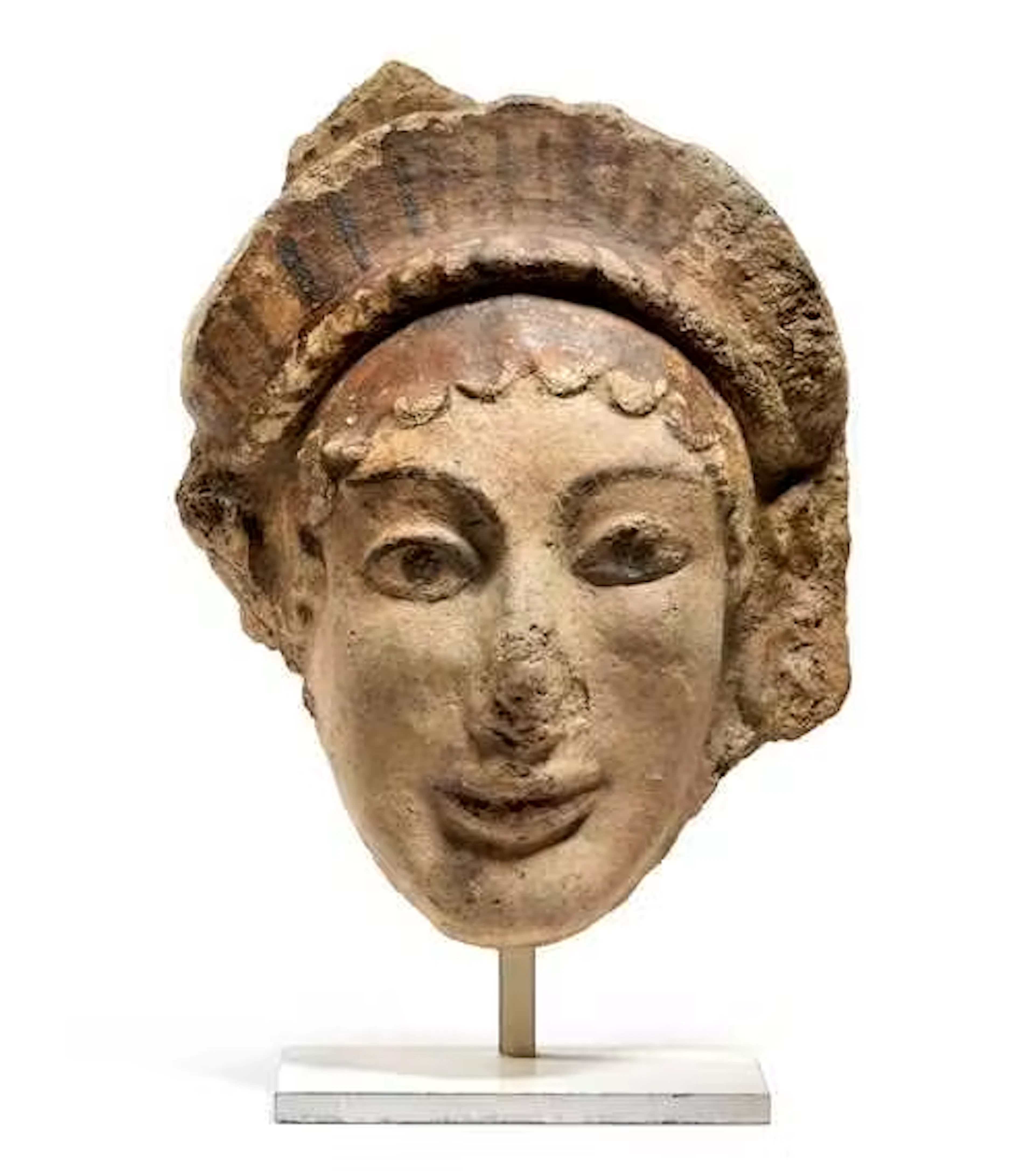 ANTEFIX IN THE FORM OF A WOMAN'S HEAD