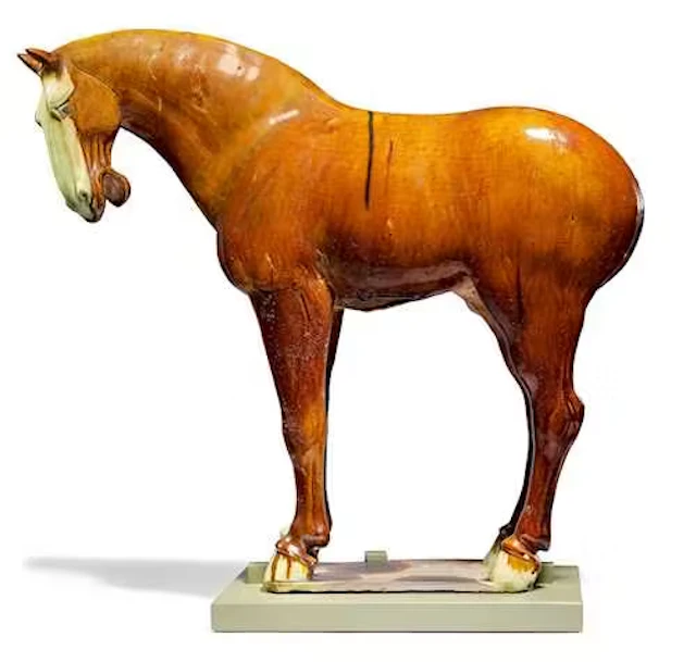 A SANCAI-GLAZED POTTERY FIGURE OF A HORSE