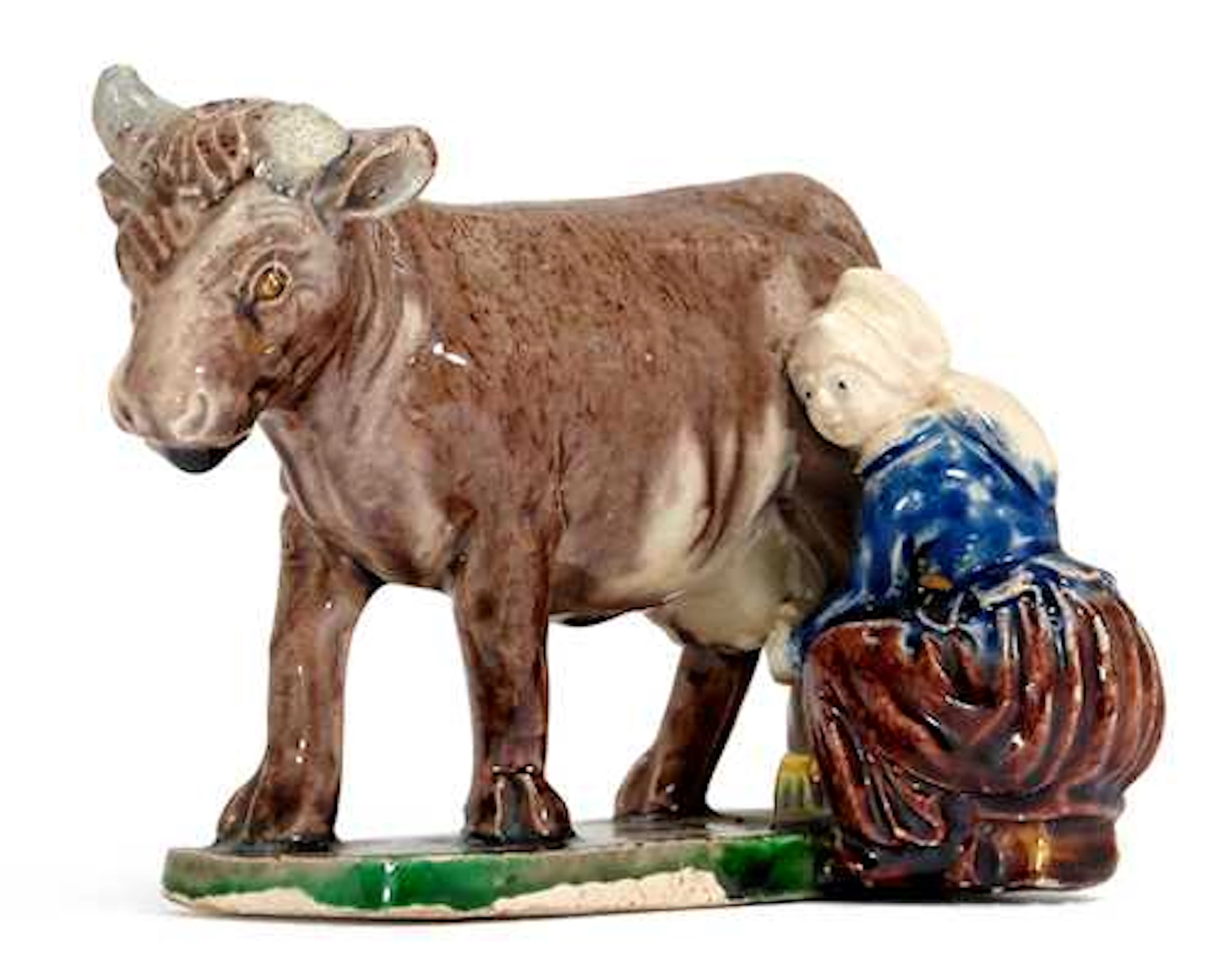 FAIENCE MODEL OF A PEASANT WOMAN MILKING A COW