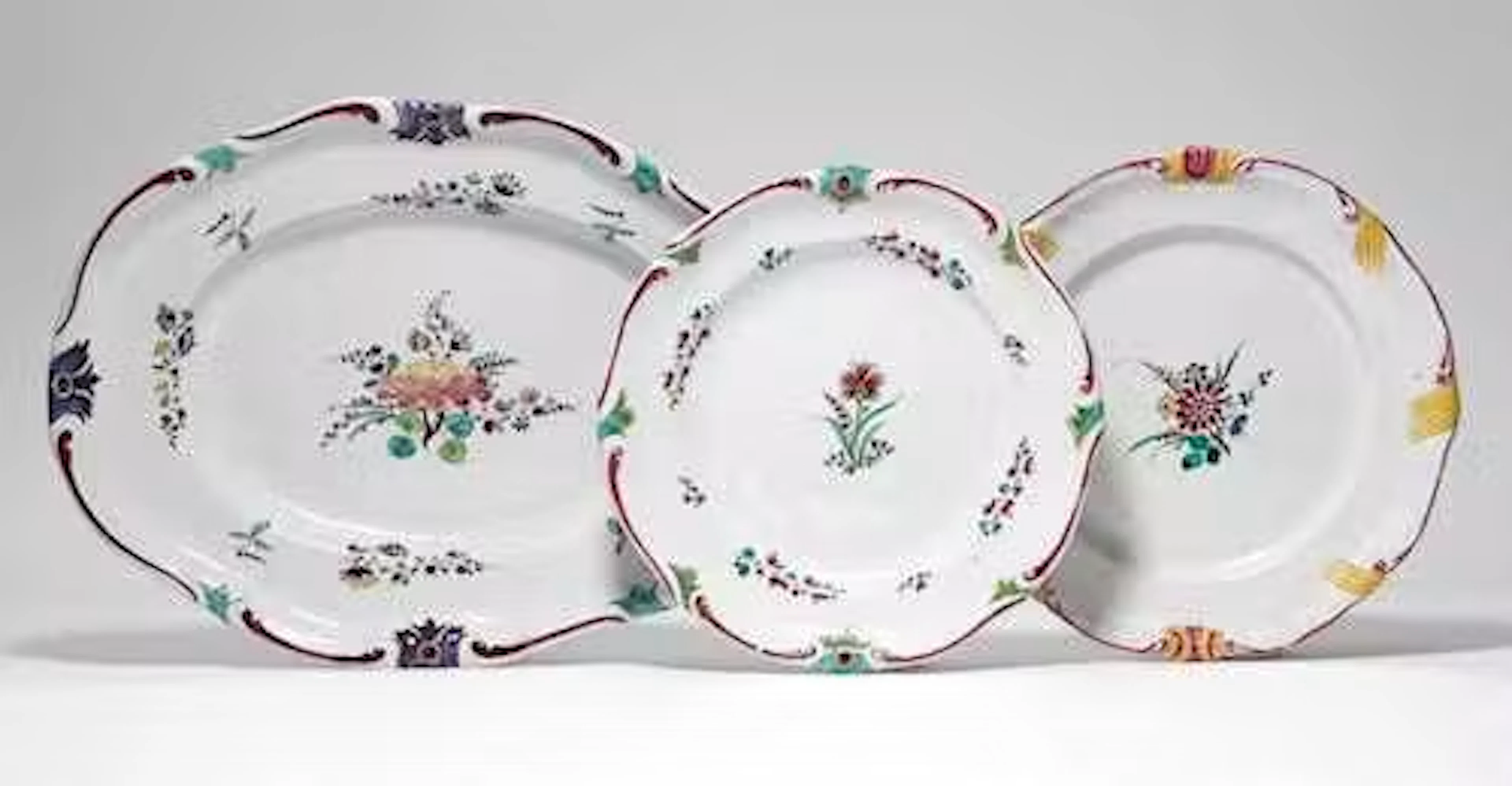 A PLATTER AND TWO PLATES