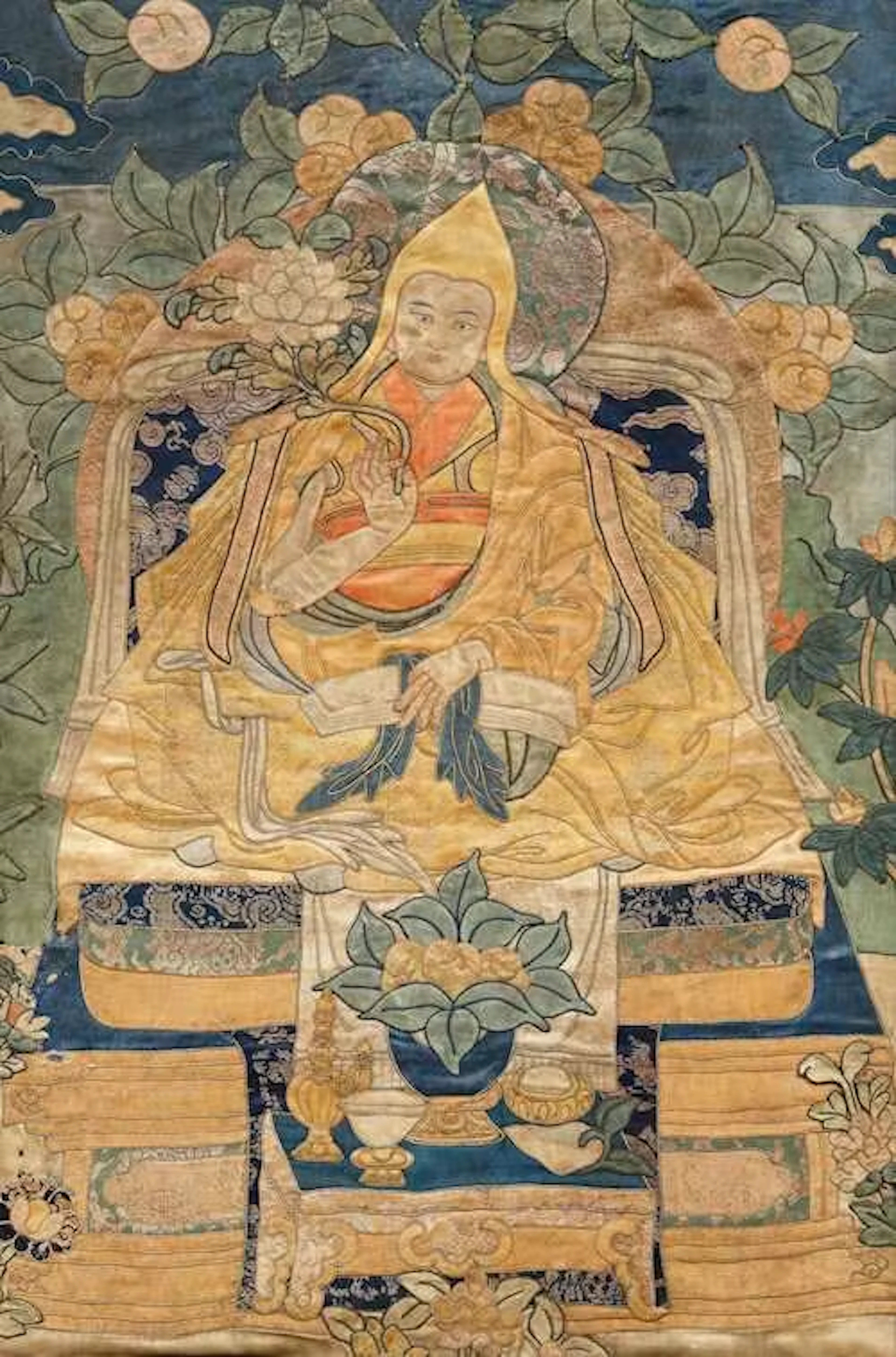 A FINE SILK APPLIQUE THANGKA OF THE 7. DALAI LAMA