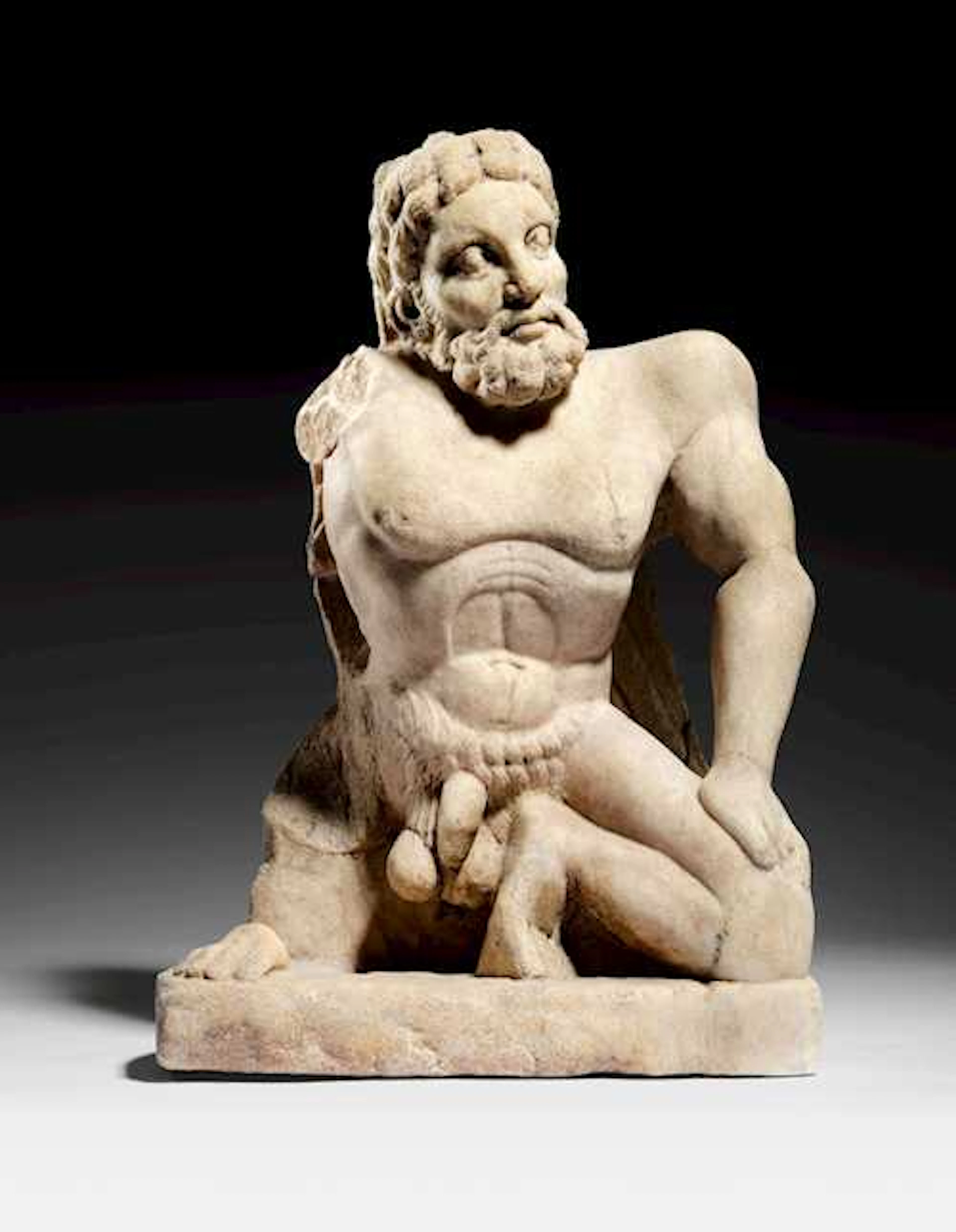 A RARE FIGURE OF A MARBLE ATLAS